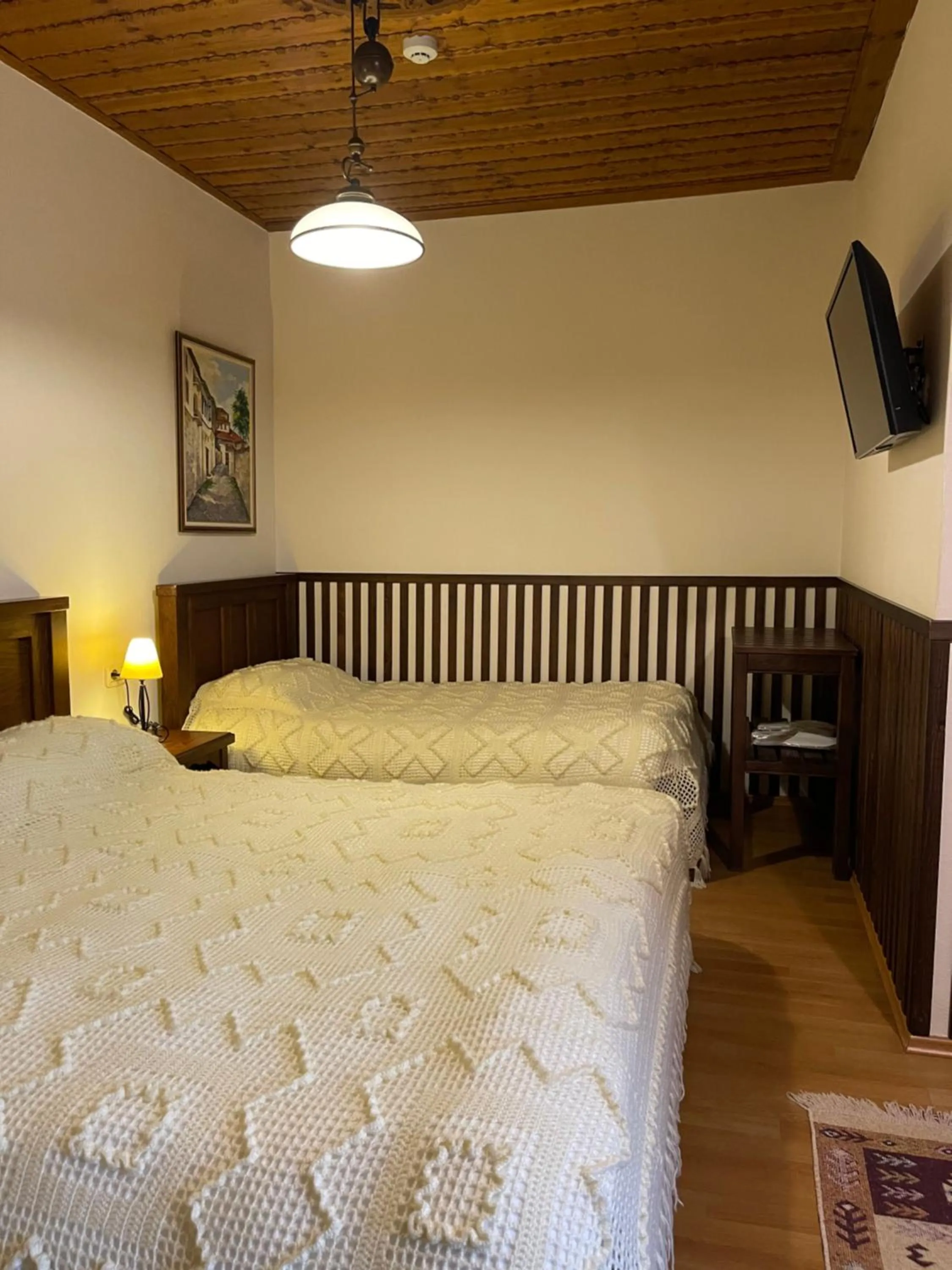 Bed in Hotel Mangalemi