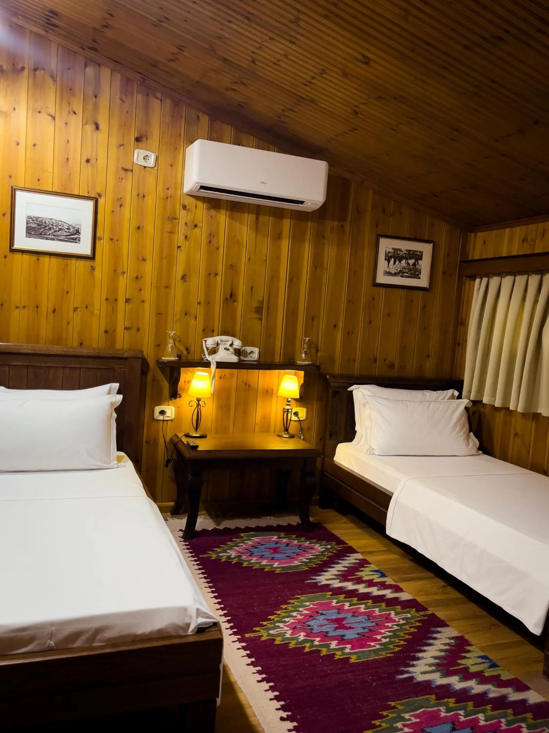 Bed in Hotel Mangalemi