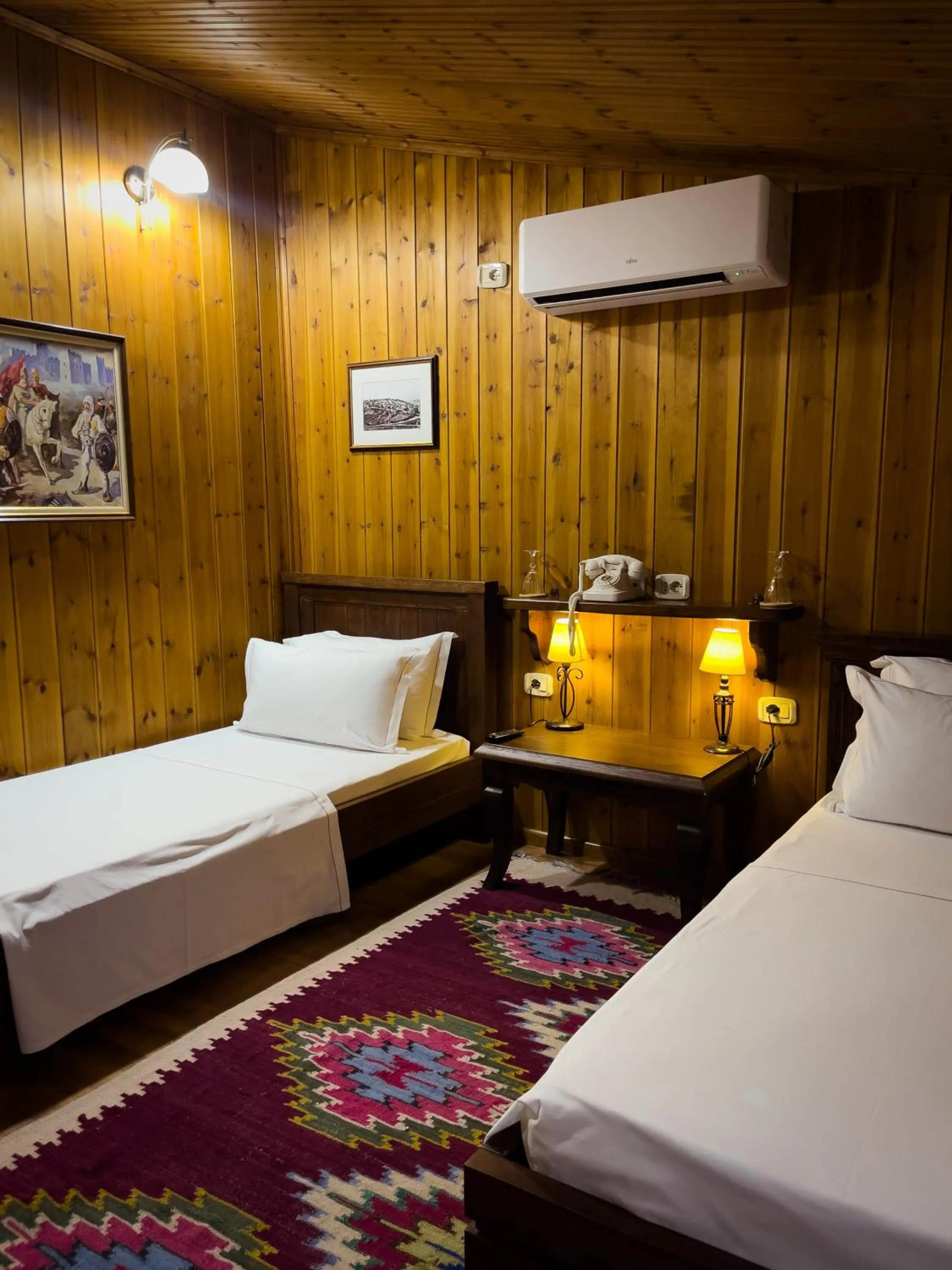 Bed in Hotel Mangalemi