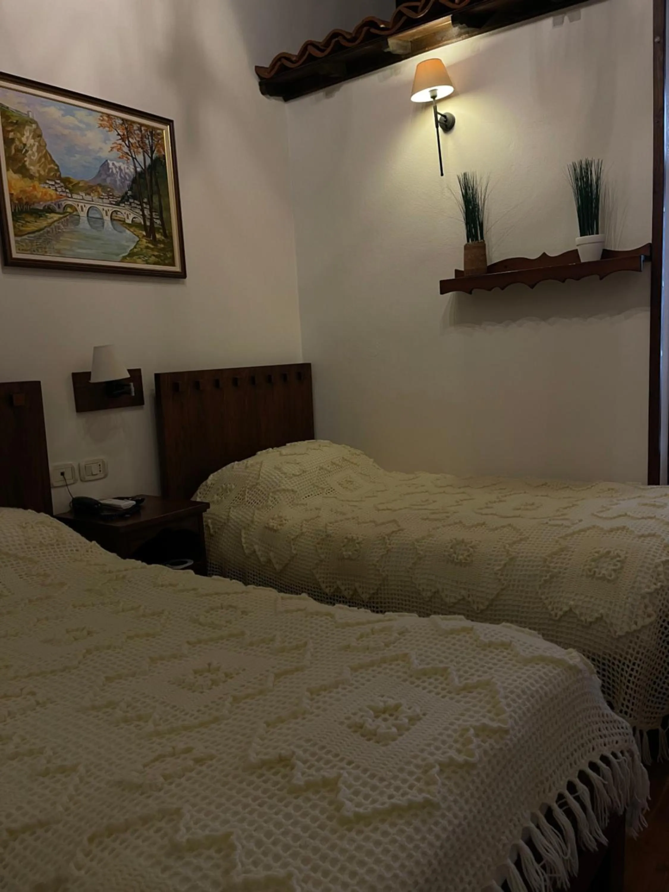 Bed in Hotel Mangalemi