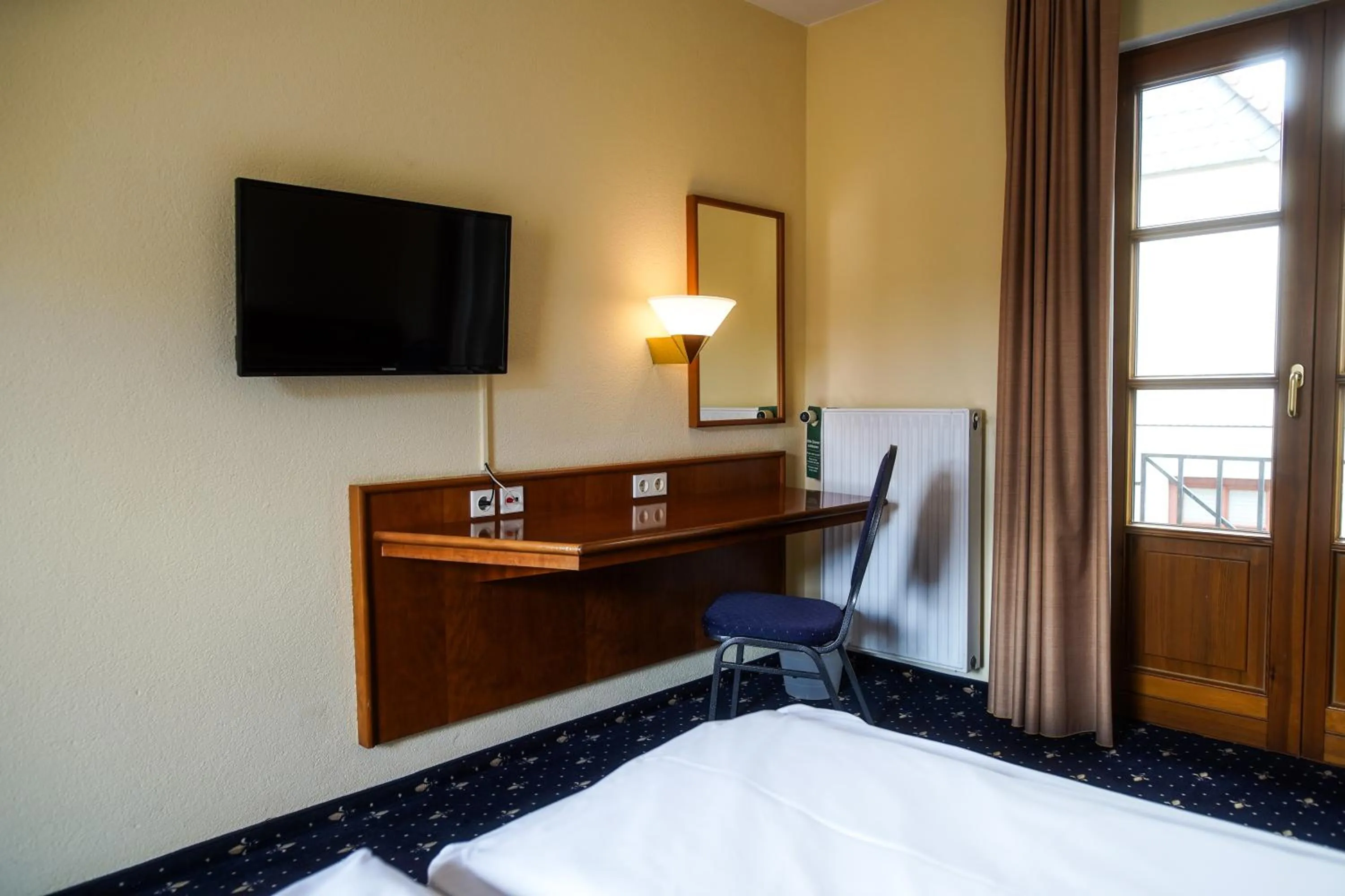 Bed in Hotel Erlenbacher Hof