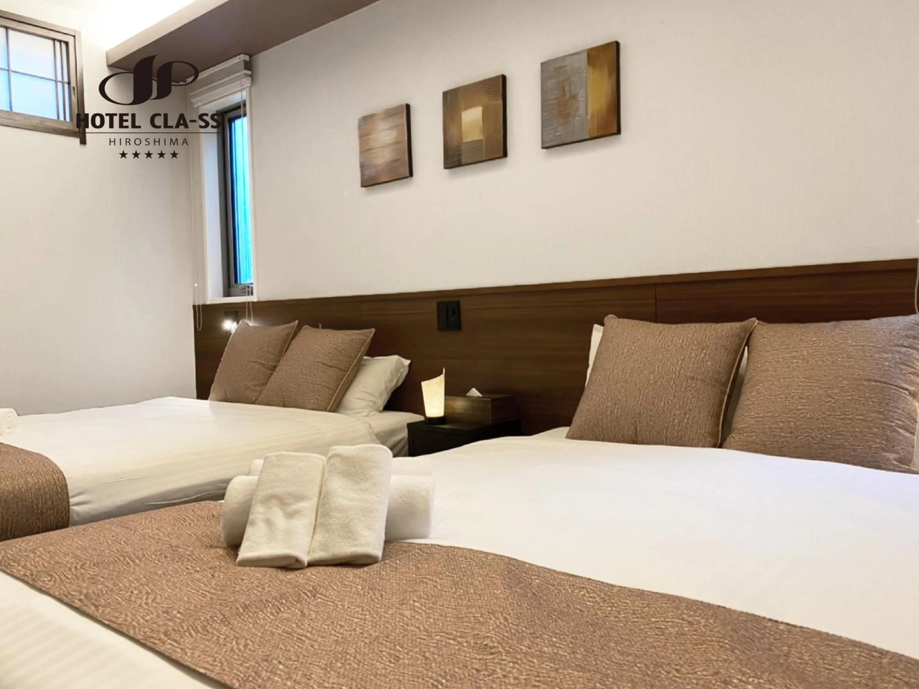 Bed in HOTEL CLA-SS HIROSHIMA-OZU