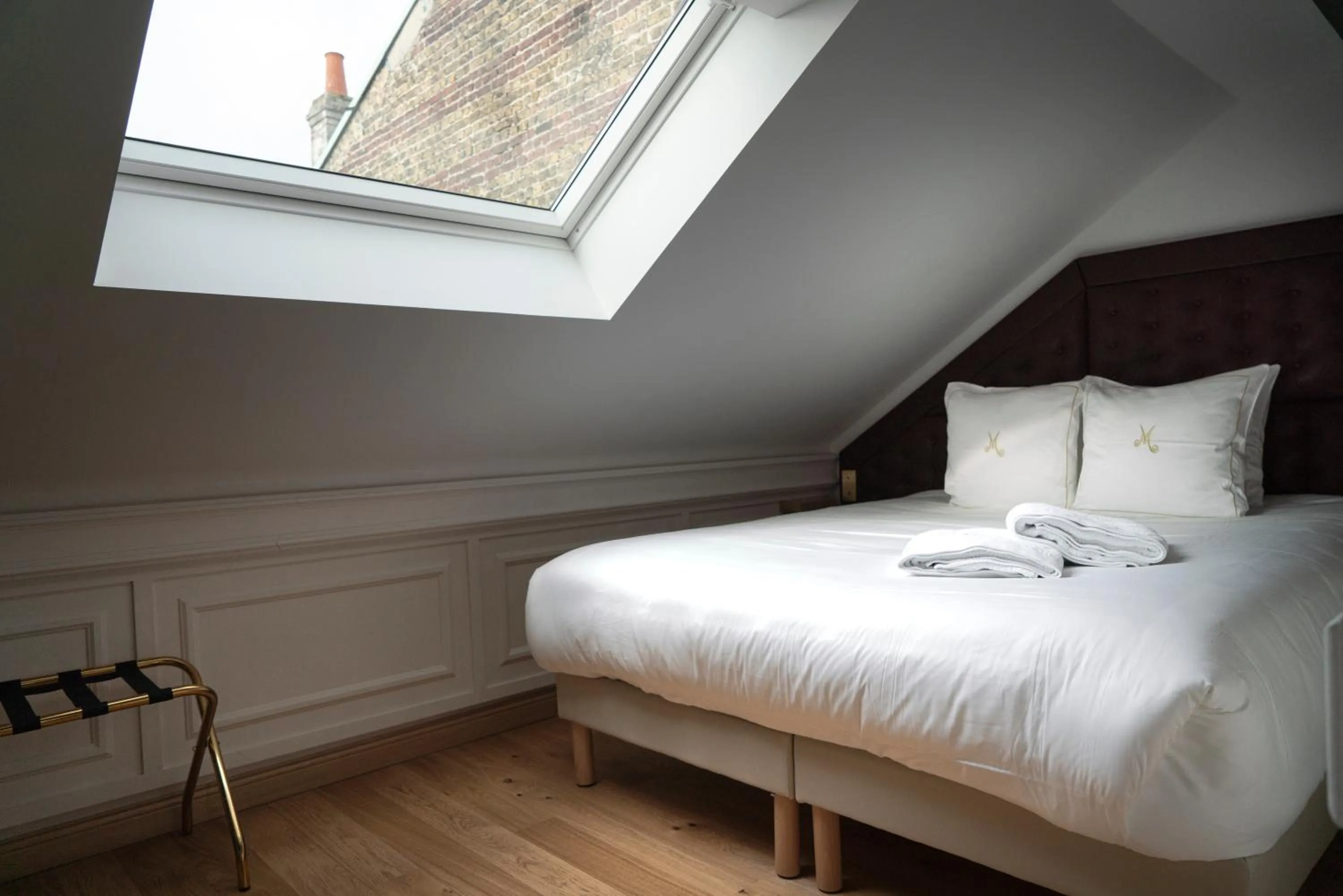 Bed in Hôtel Merveilleux Côté Mer