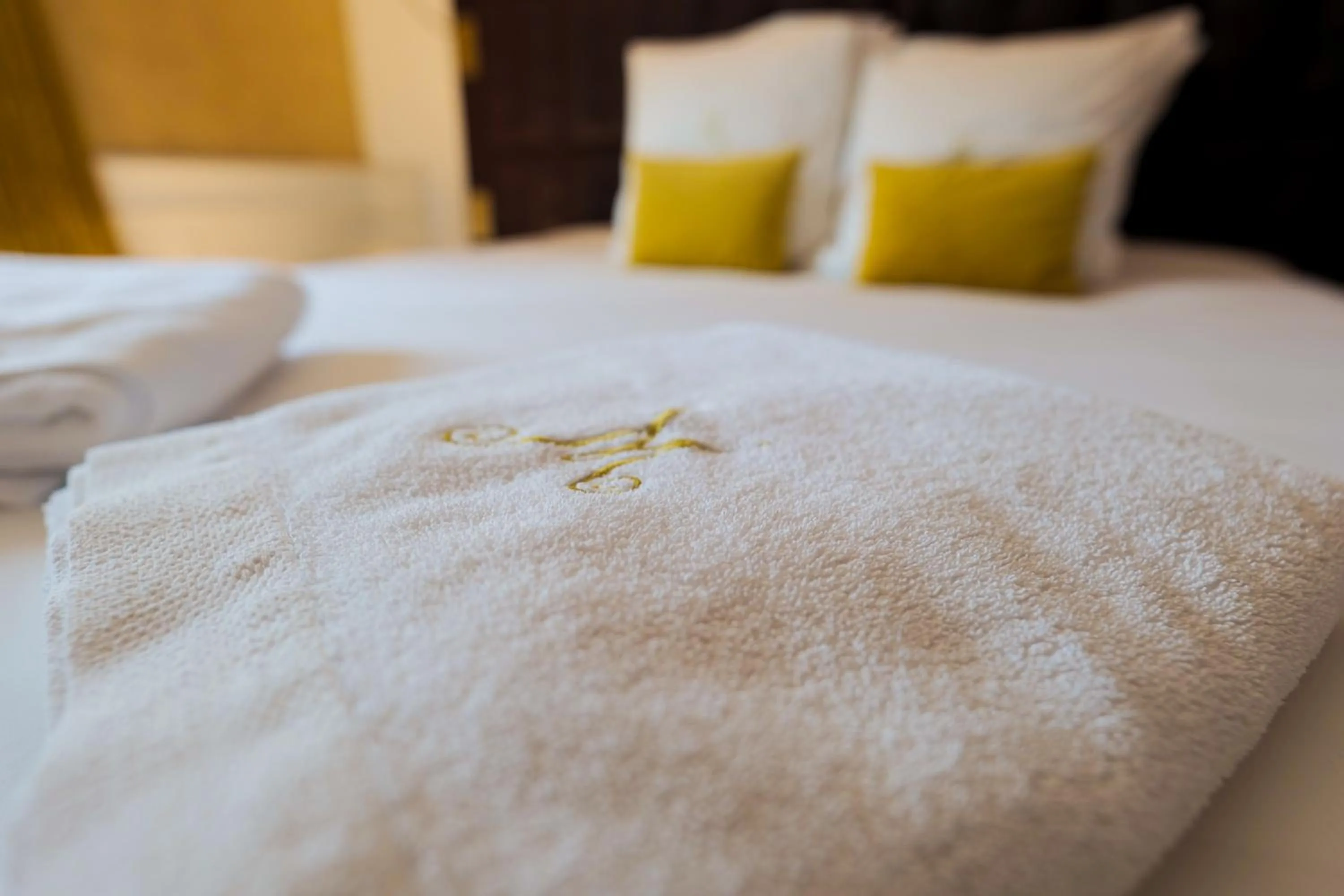 Bed in Hôtel Merveilleux Côté Mer