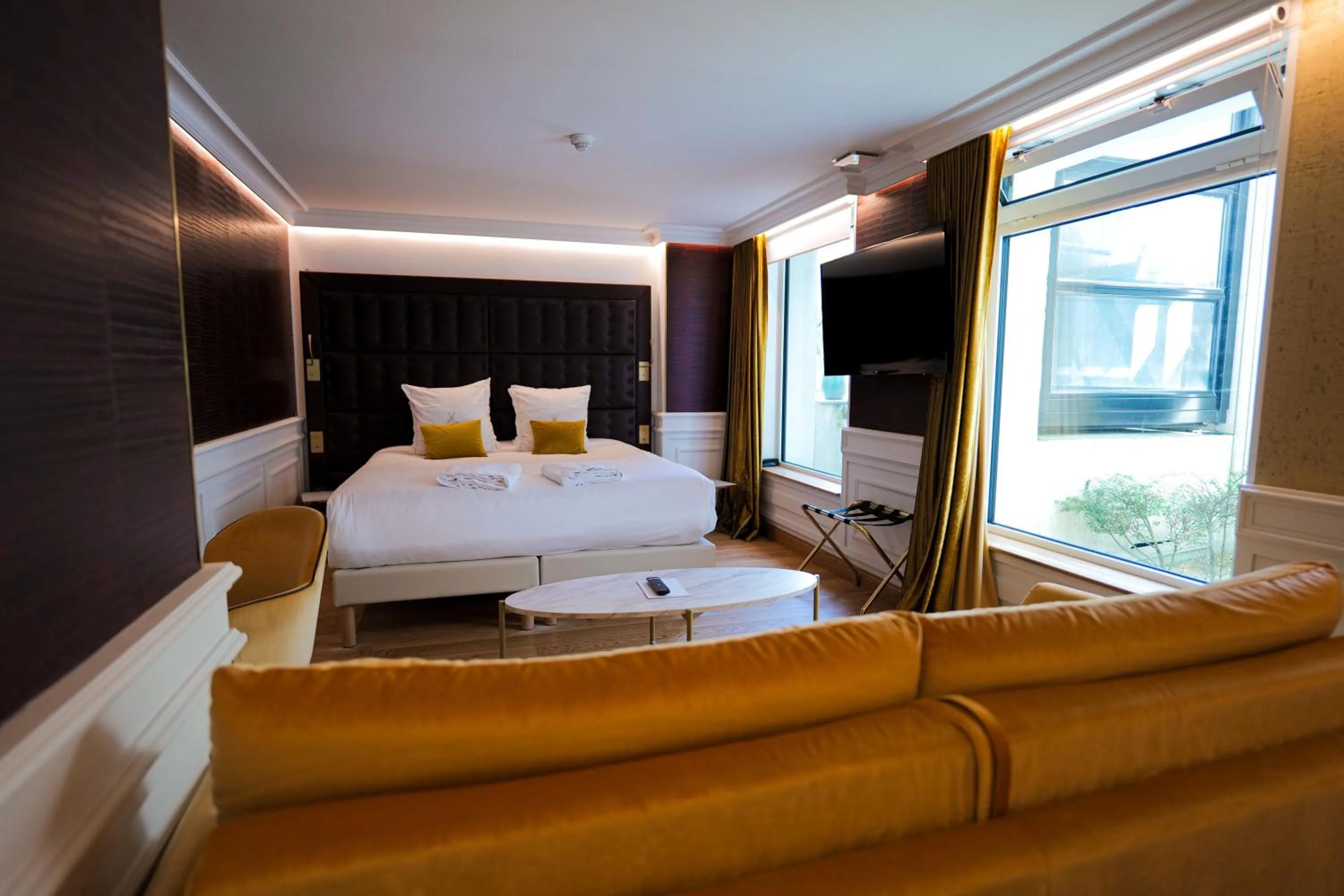 Bed in Hôtel Merveilleux Côté Mer