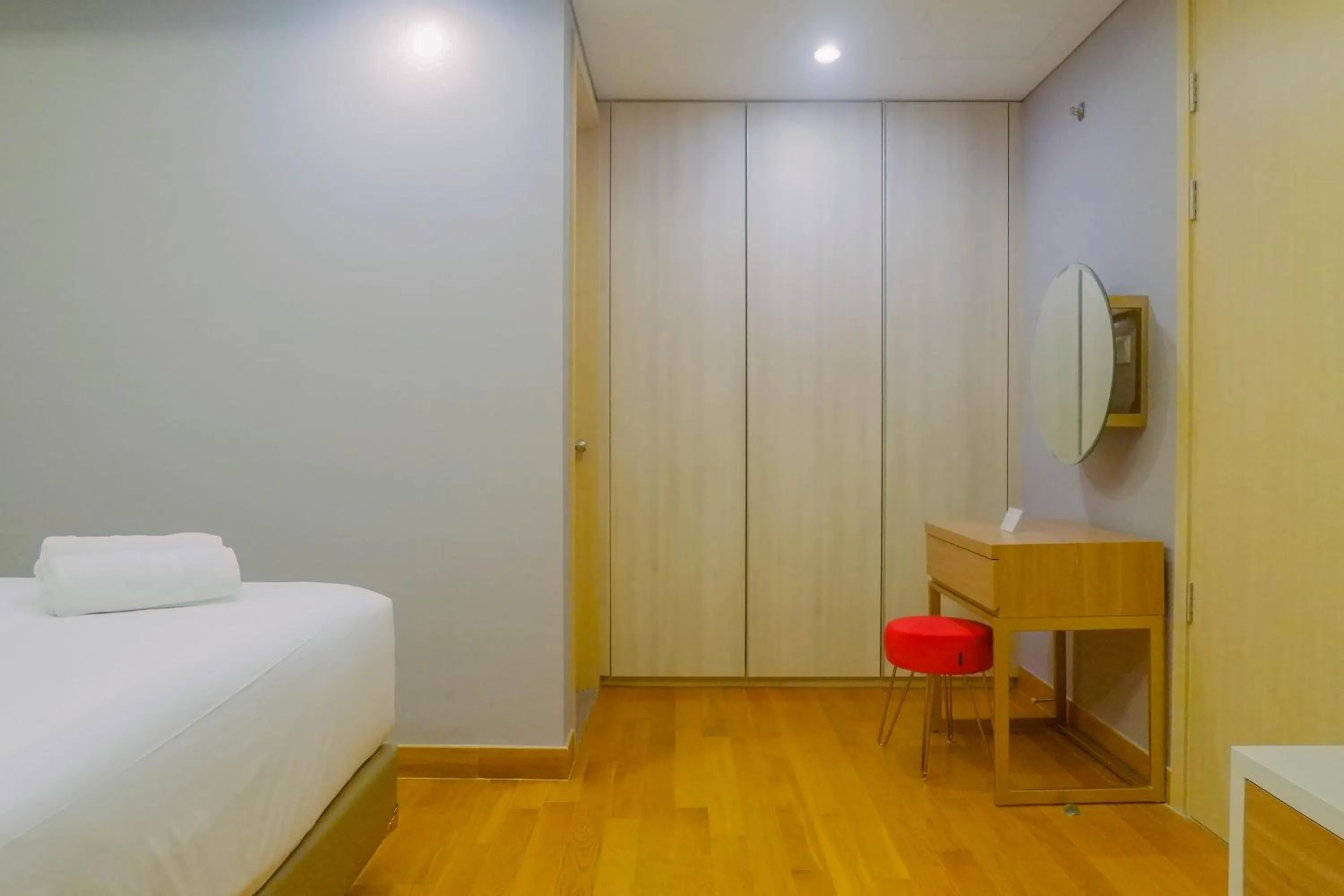 Bed in Luxurious & Spacious 2BR Apartment at One East Residences By Travelio