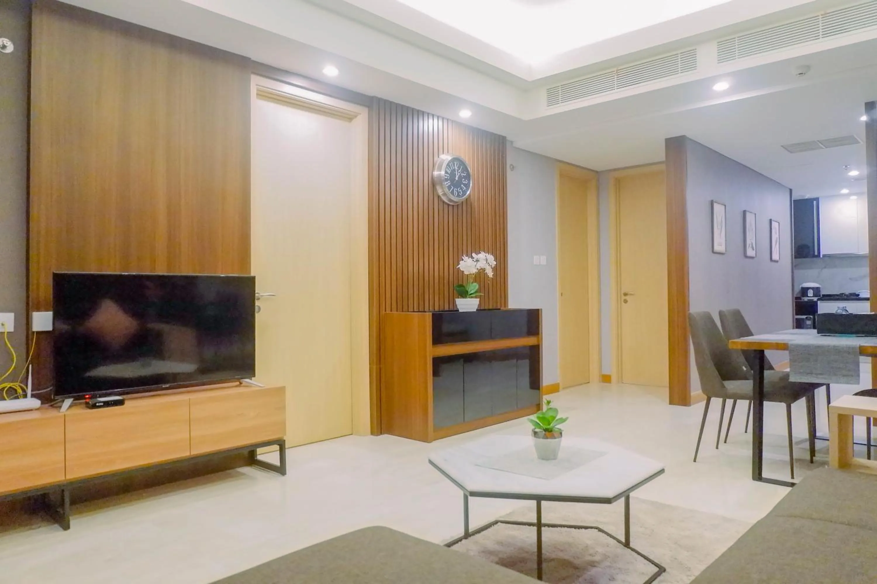 Living room in Luxurious & Spacious 2BR Apartment at One East Residences By Travelio