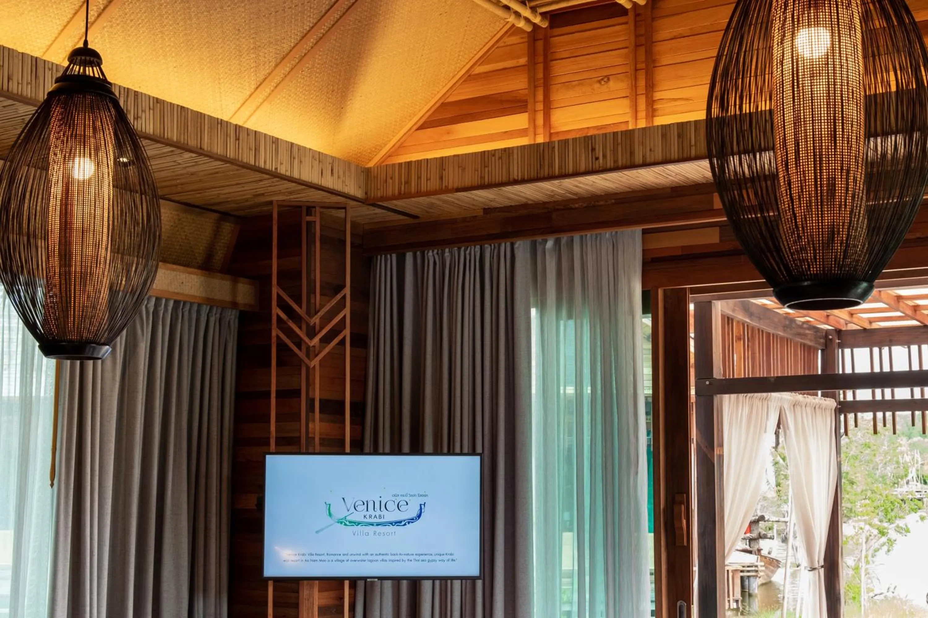 Communal lounge/ TV room in Venice Krabi Villa Resort