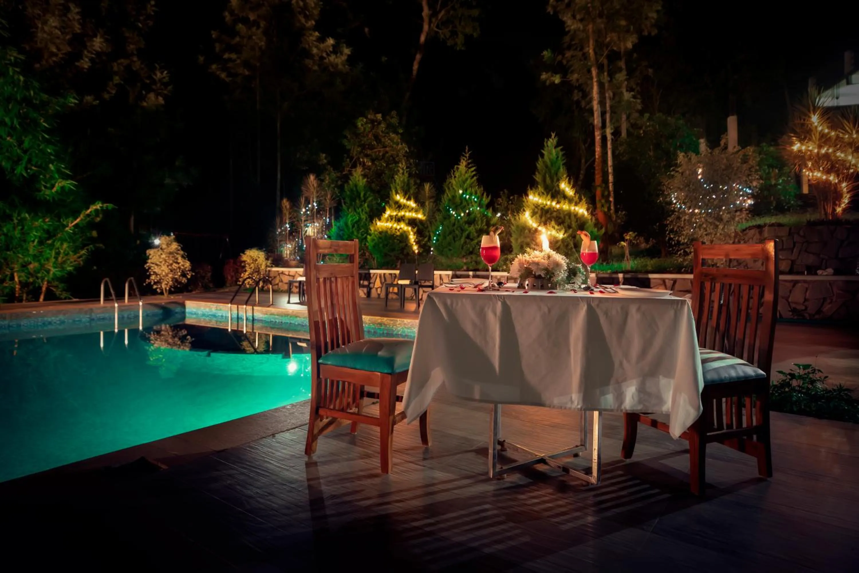 Swimming pool in The Blossom Resort - Chikmagalur