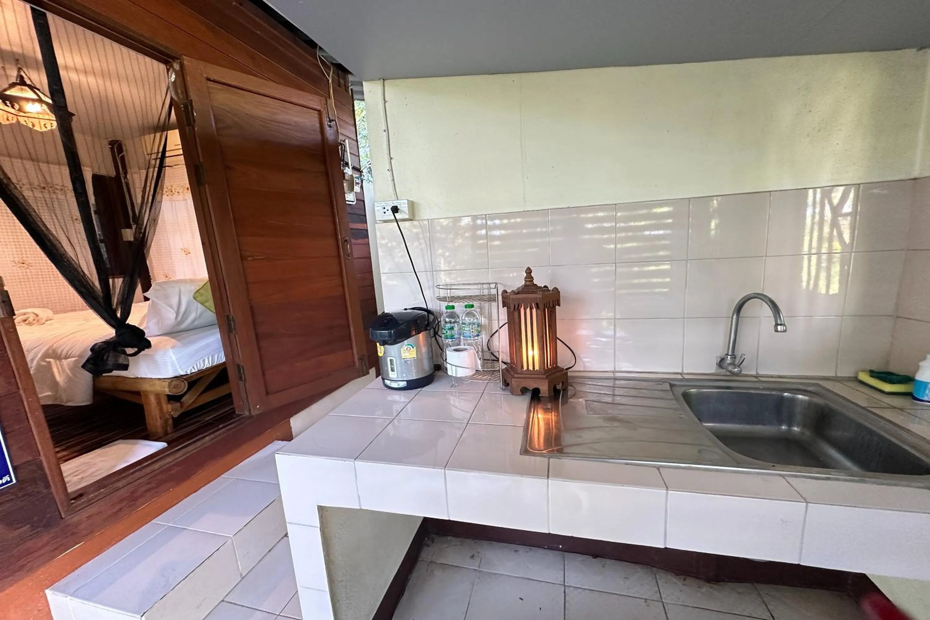 Kitchen or kitchenette in Baansuan Chomchun