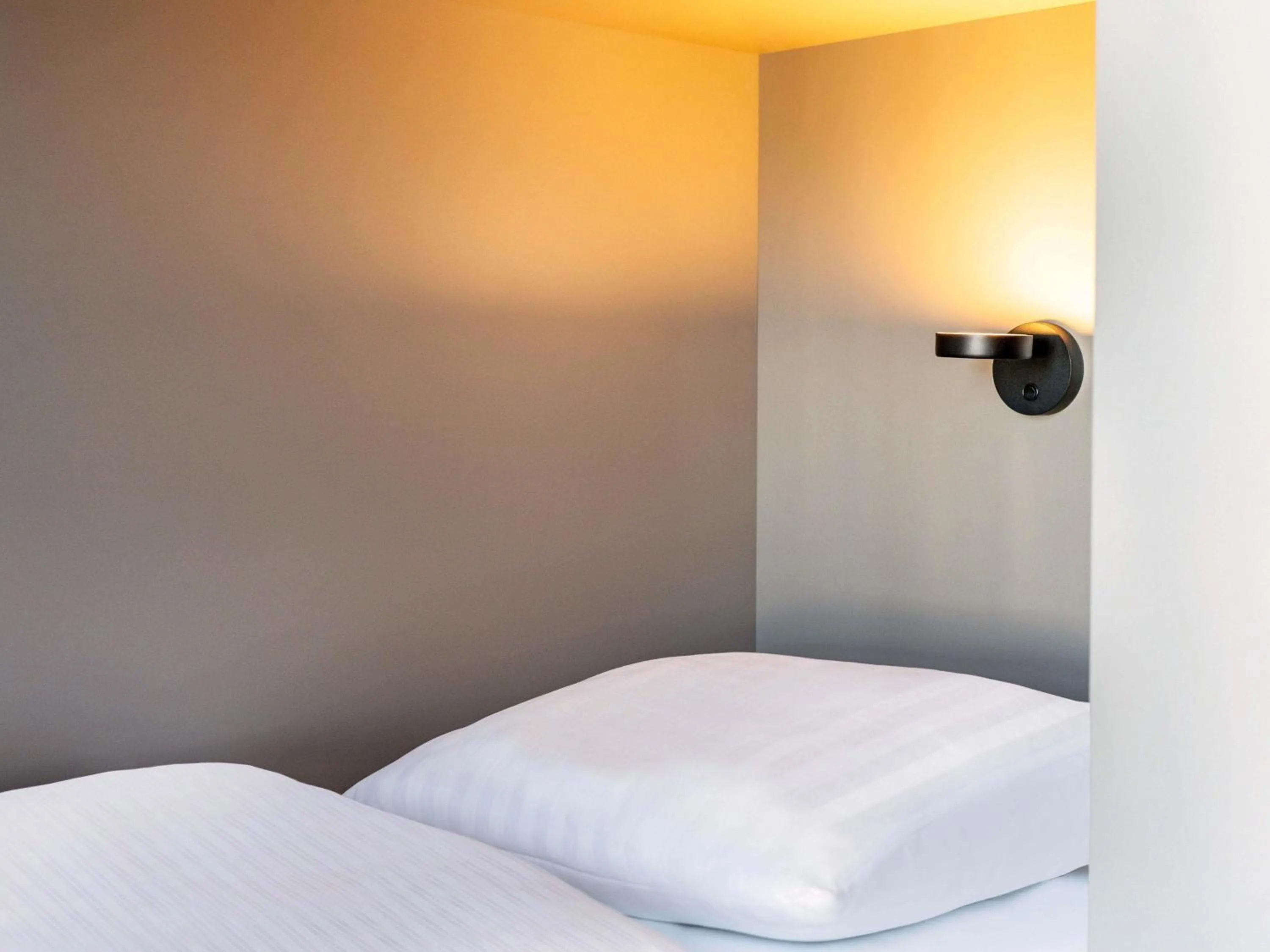 Photo of the whole room, Bed in B&B HOTEL Saarbrücken-Ost