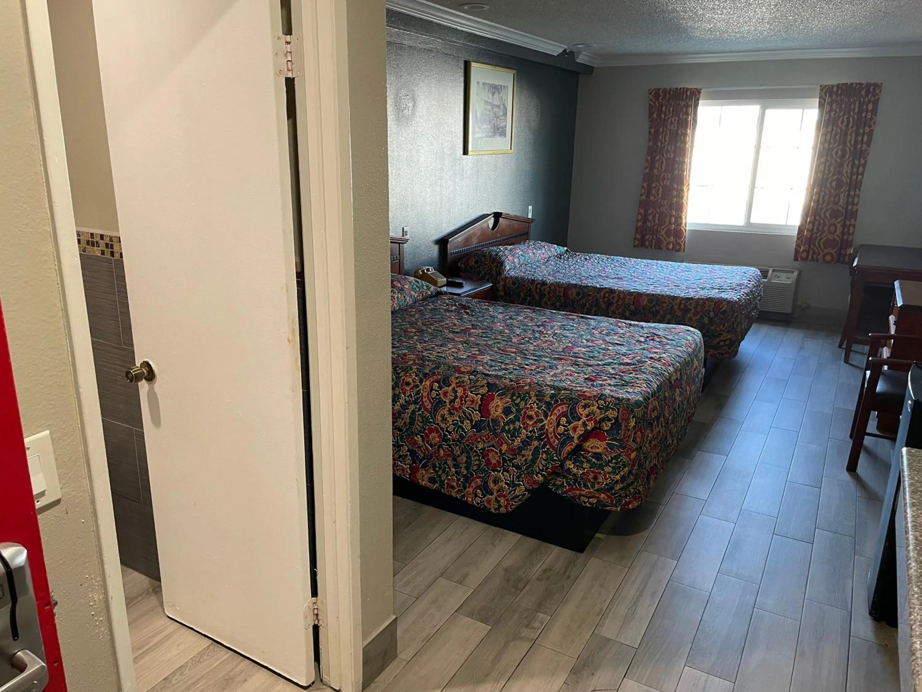 Bedroom in Heritage inn and suites