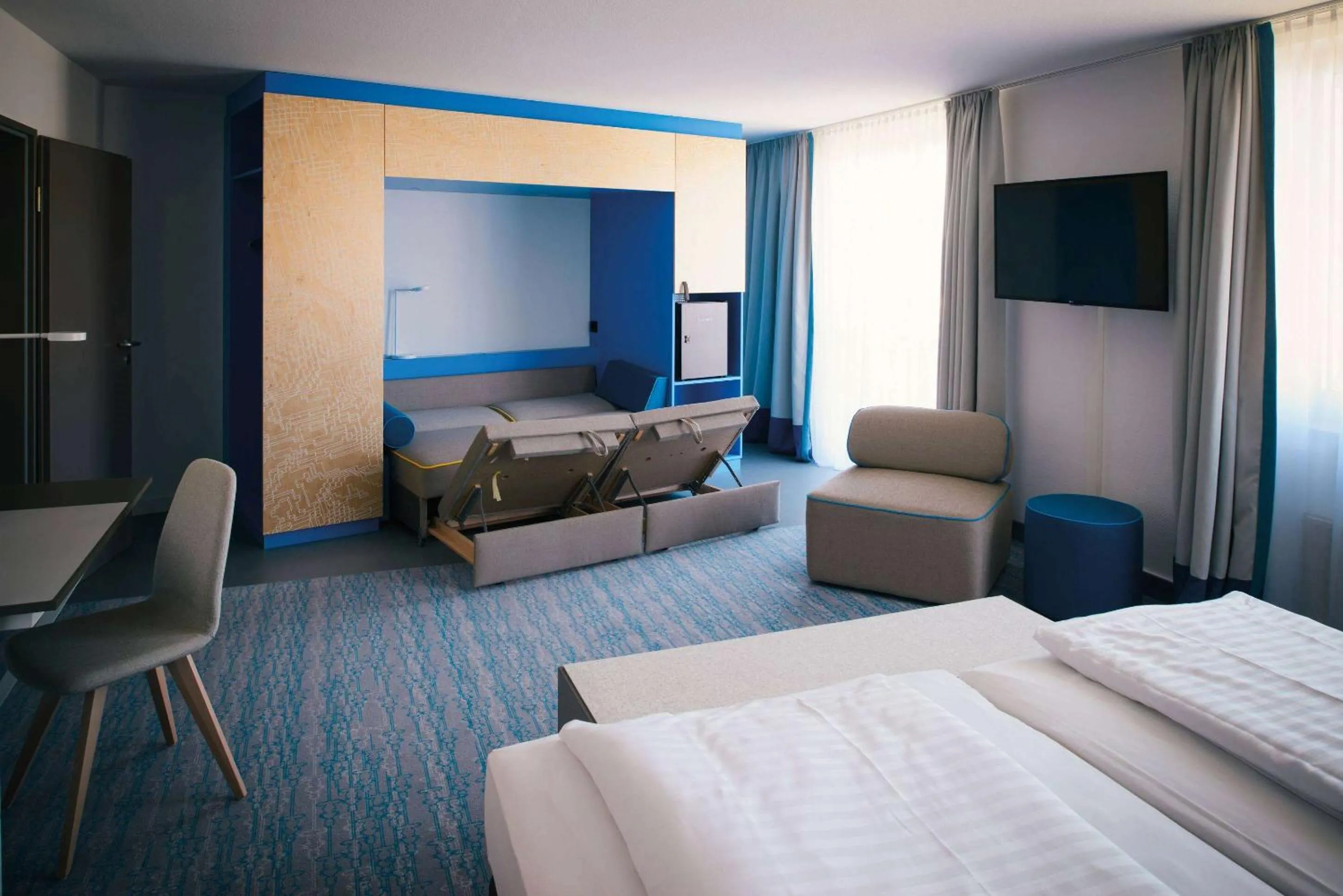 Photo of the whole room, Bed in Vienna House Easy by Wyndham Günzburg