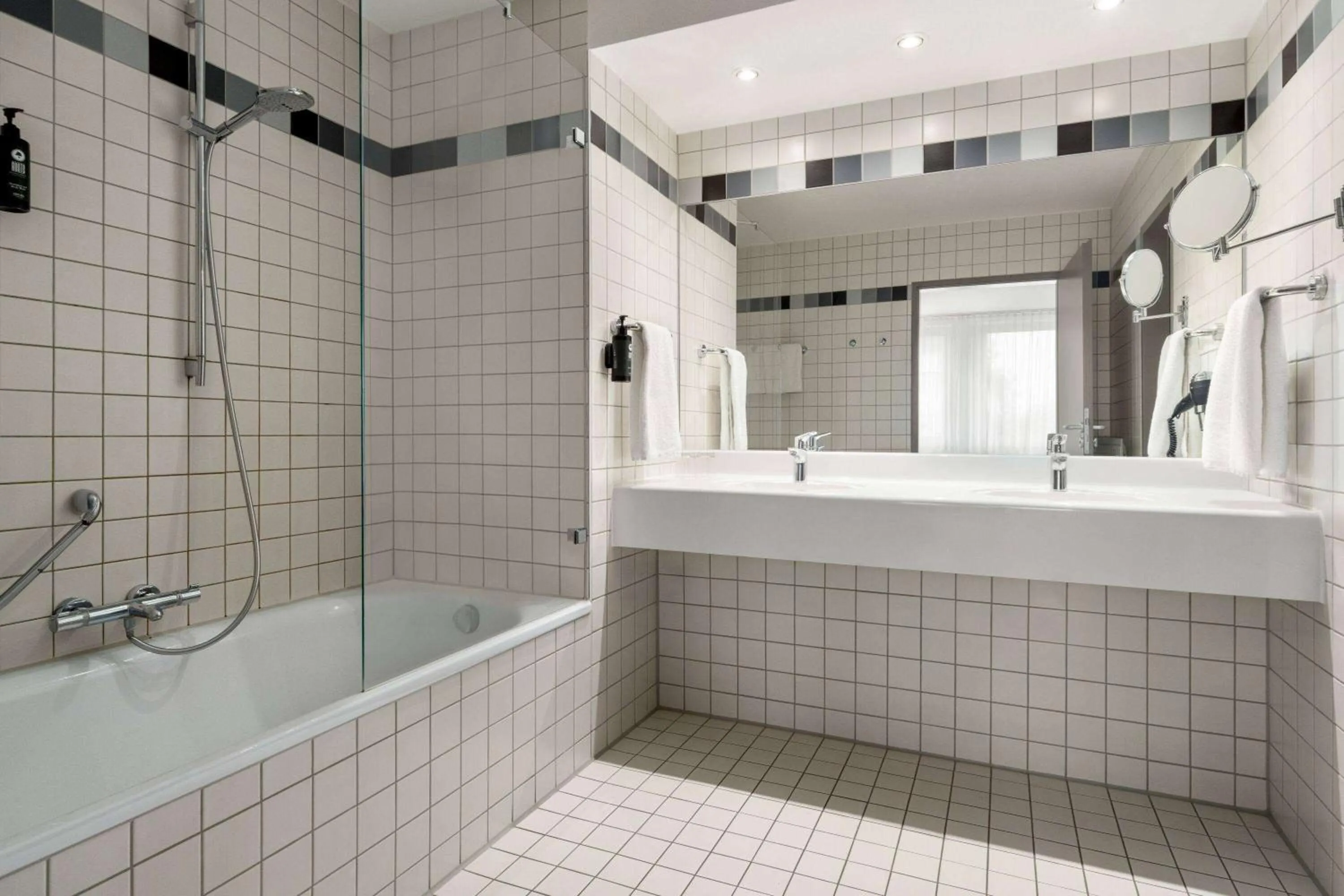 Shower in Vienna House Easy by Wyndham Günzburg