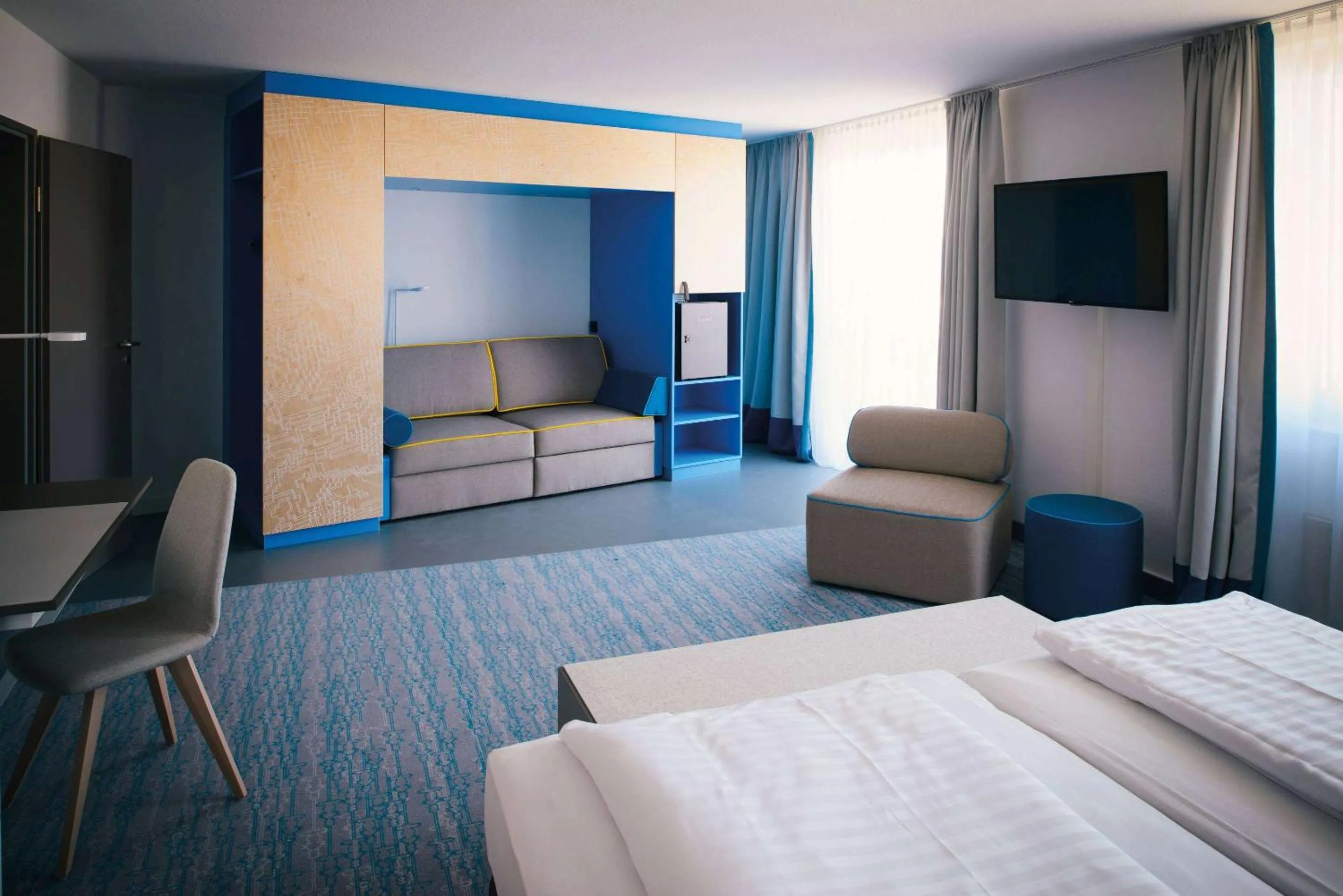 Photo of the whole room, Bed in Vienna House Easy by Wyndham Günzburg