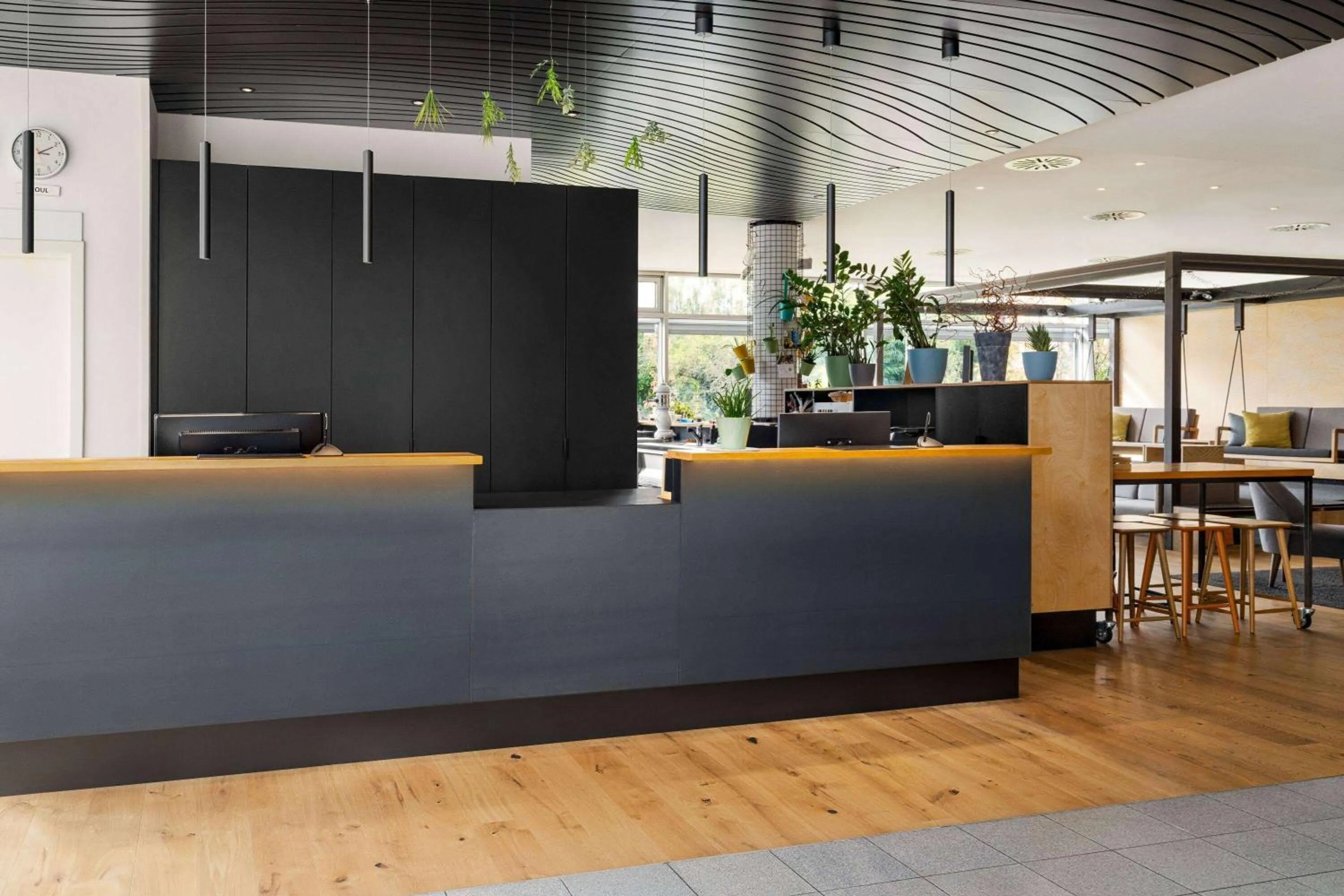 Lobby or reception in Vienna House Easy by Wyndham Günzburg