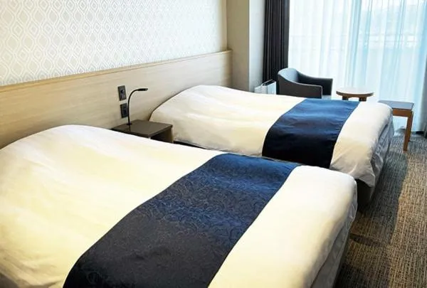 Bed in Hotel Abest Grande Takatsuki