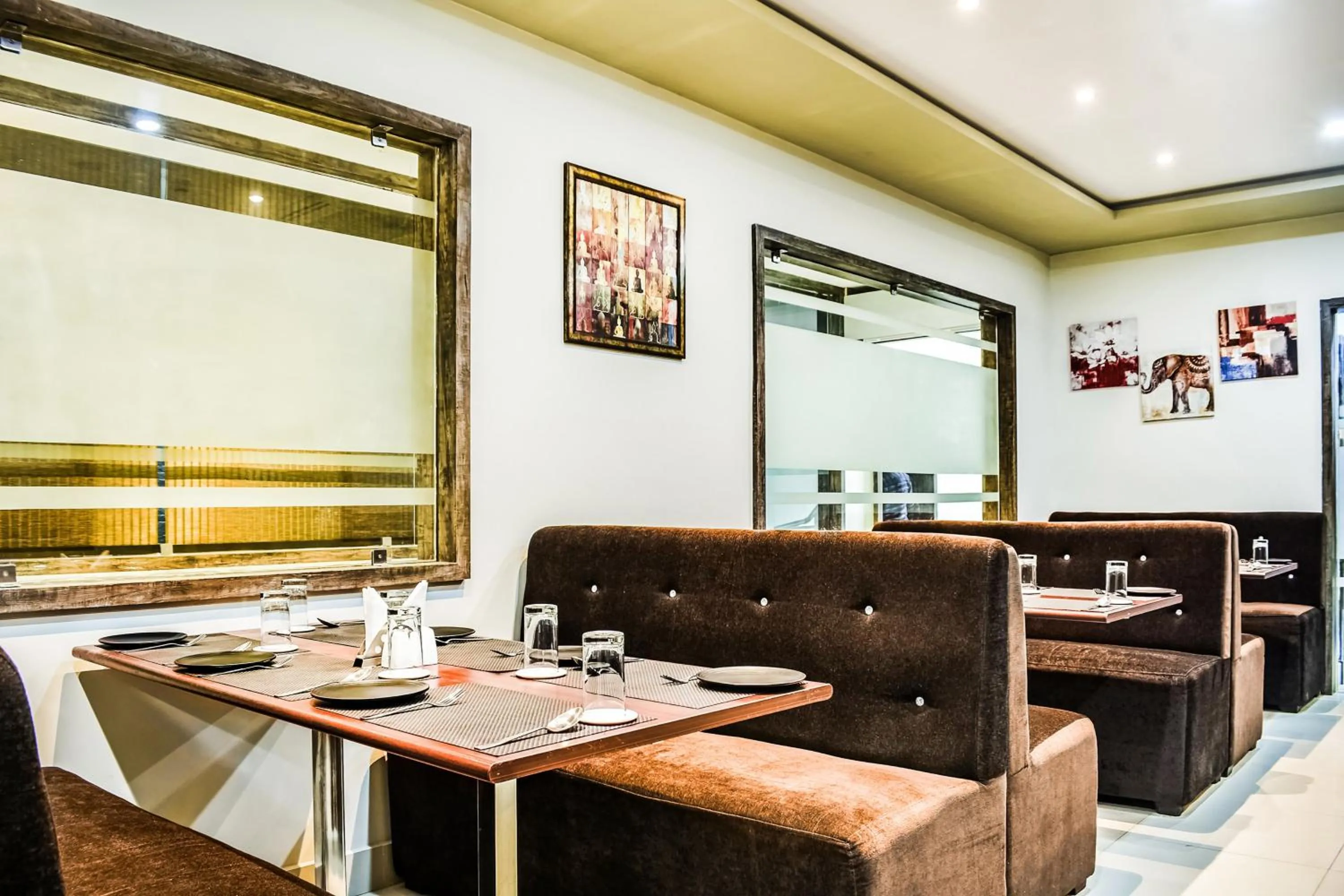 Dining area in Capital O Jai Adisson