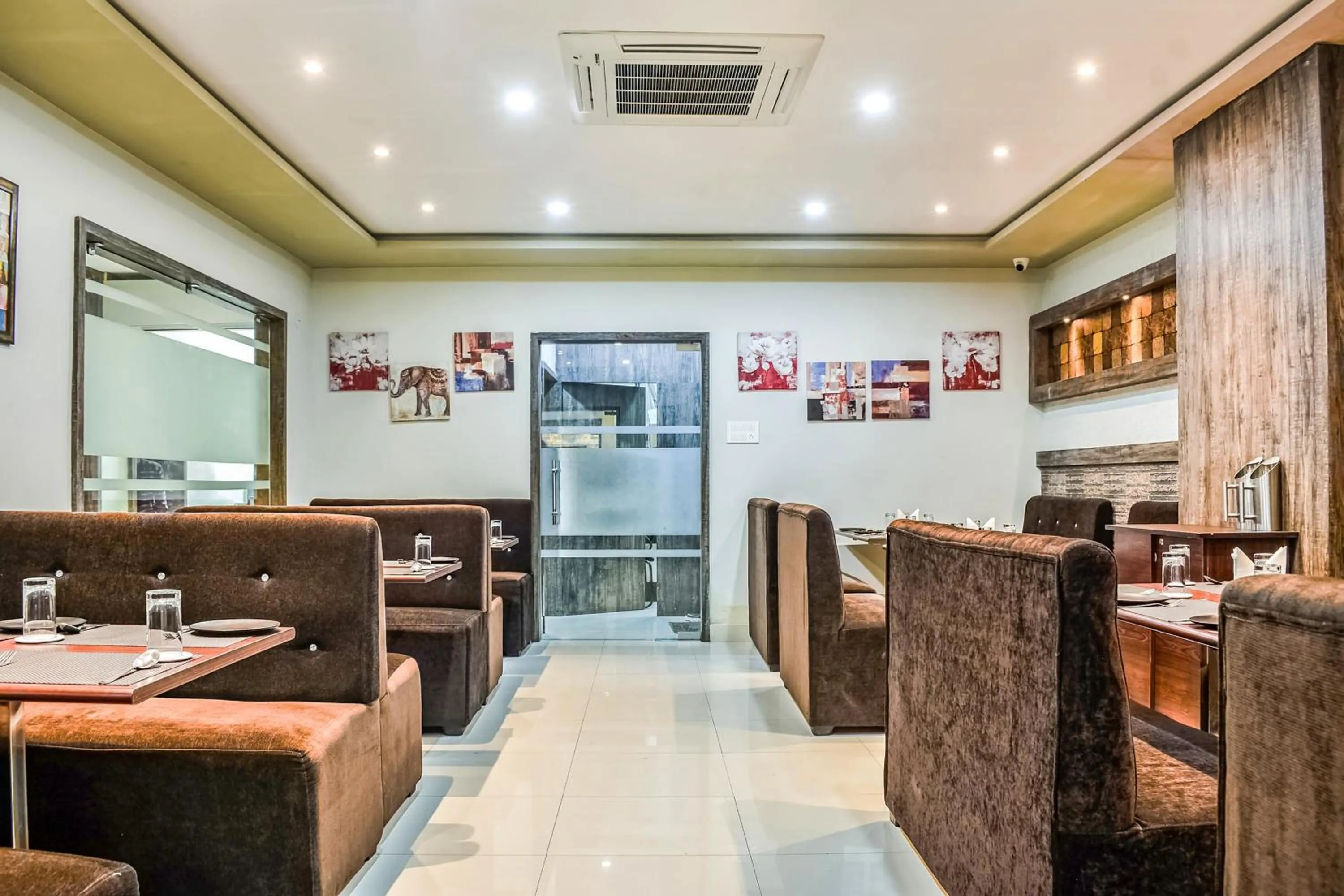 Dining area in Capital O Jai Adisson