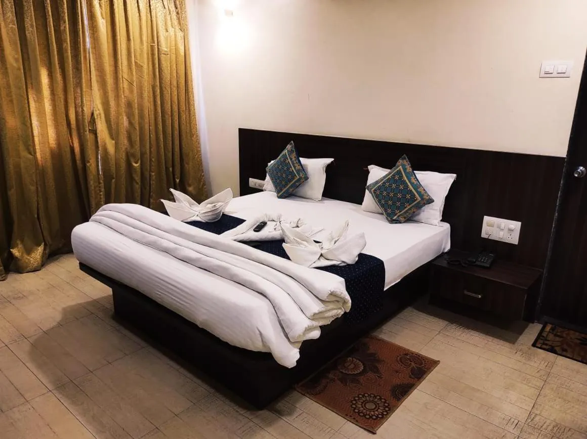 Bed in Hotel Manasi Royal