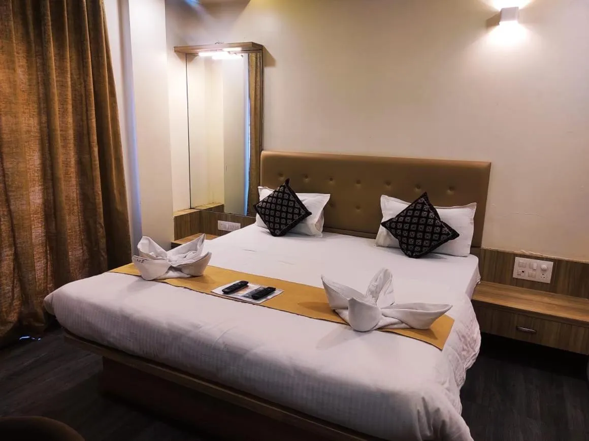 Bed in Hotel Manasi Royal