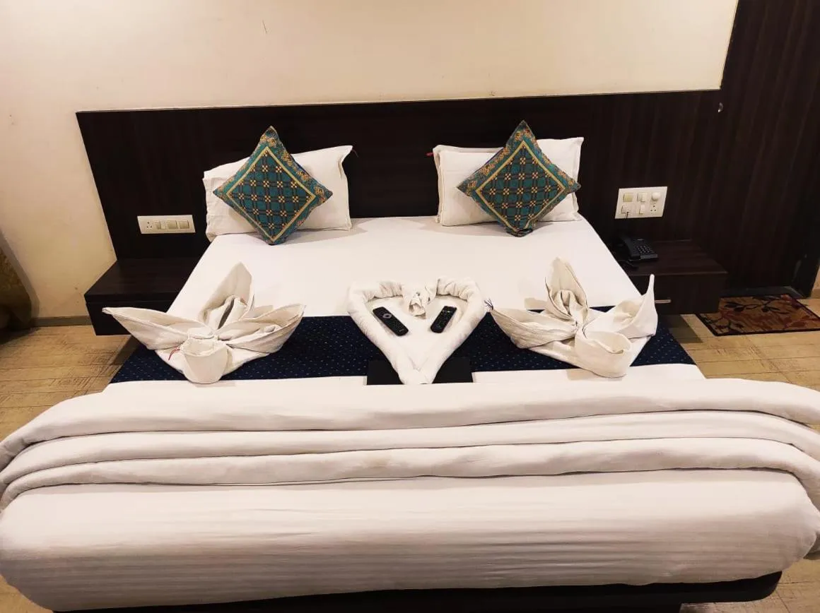Bed in Hotel Manasi Royal