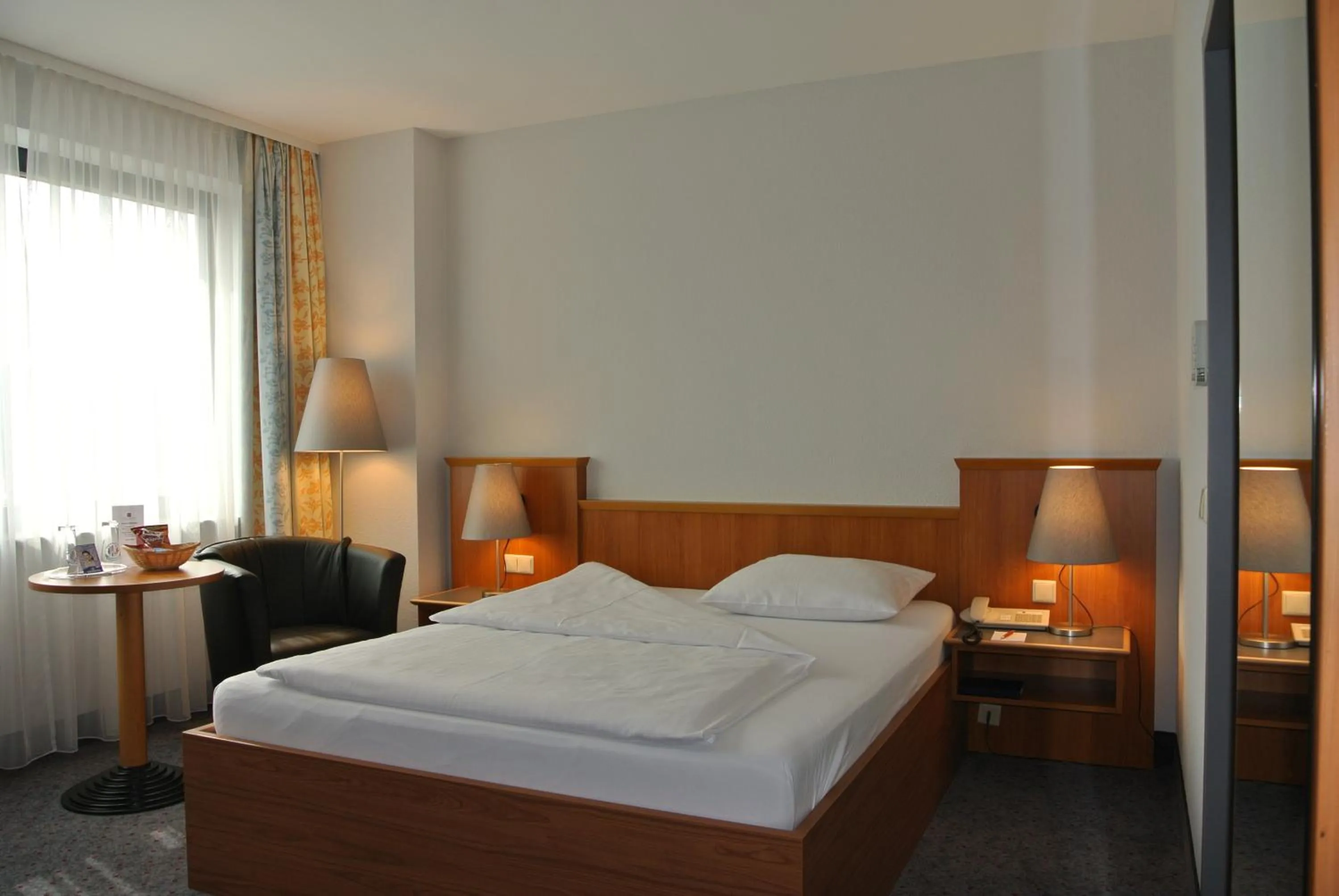 Photo of the whole room, Bed in City Hotel Suhl