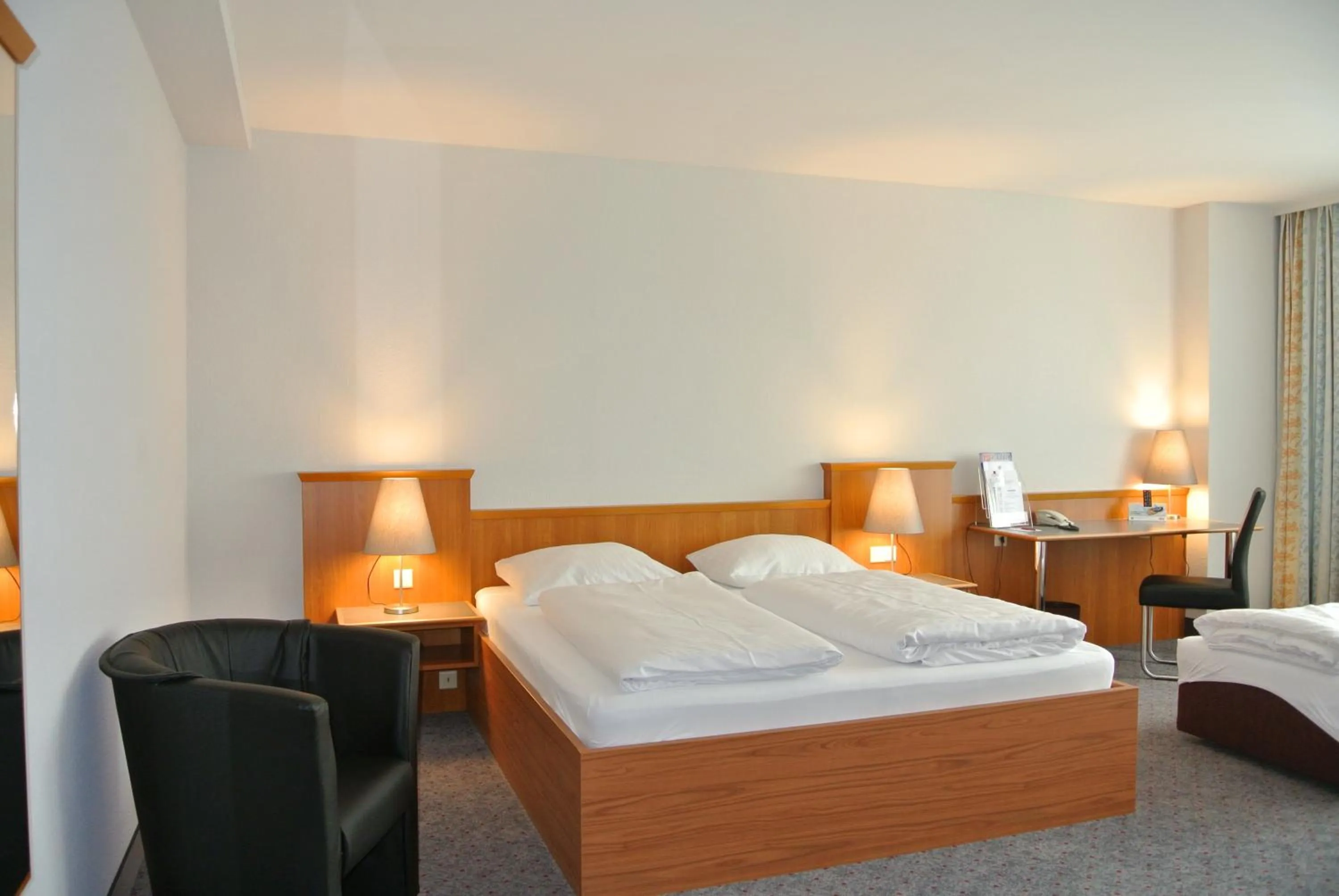 Photo of the whole room, Bed in City Hotel Suhl