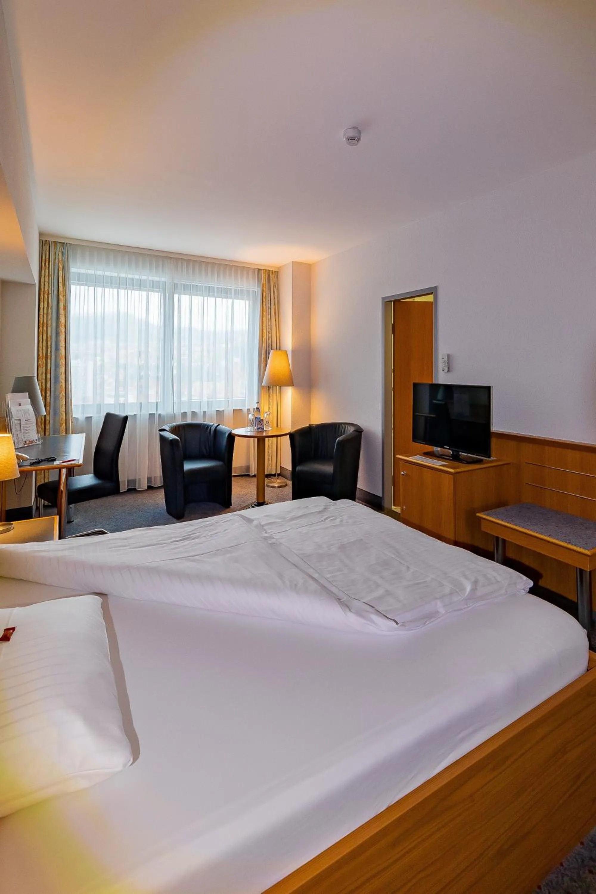 Photo of the whole room, Bed in City Hotel Suhl