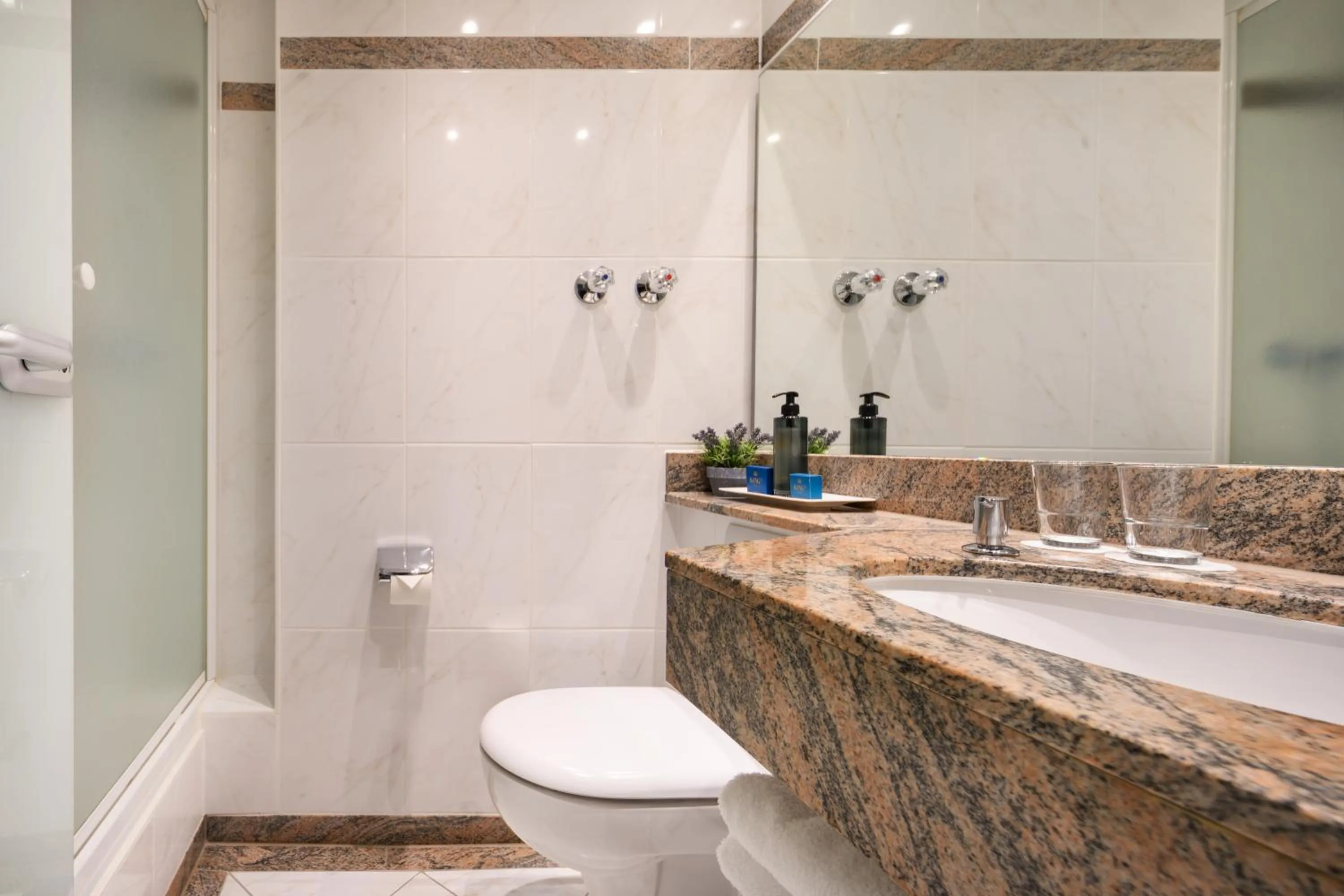 Bathroom in KING's Hotel First