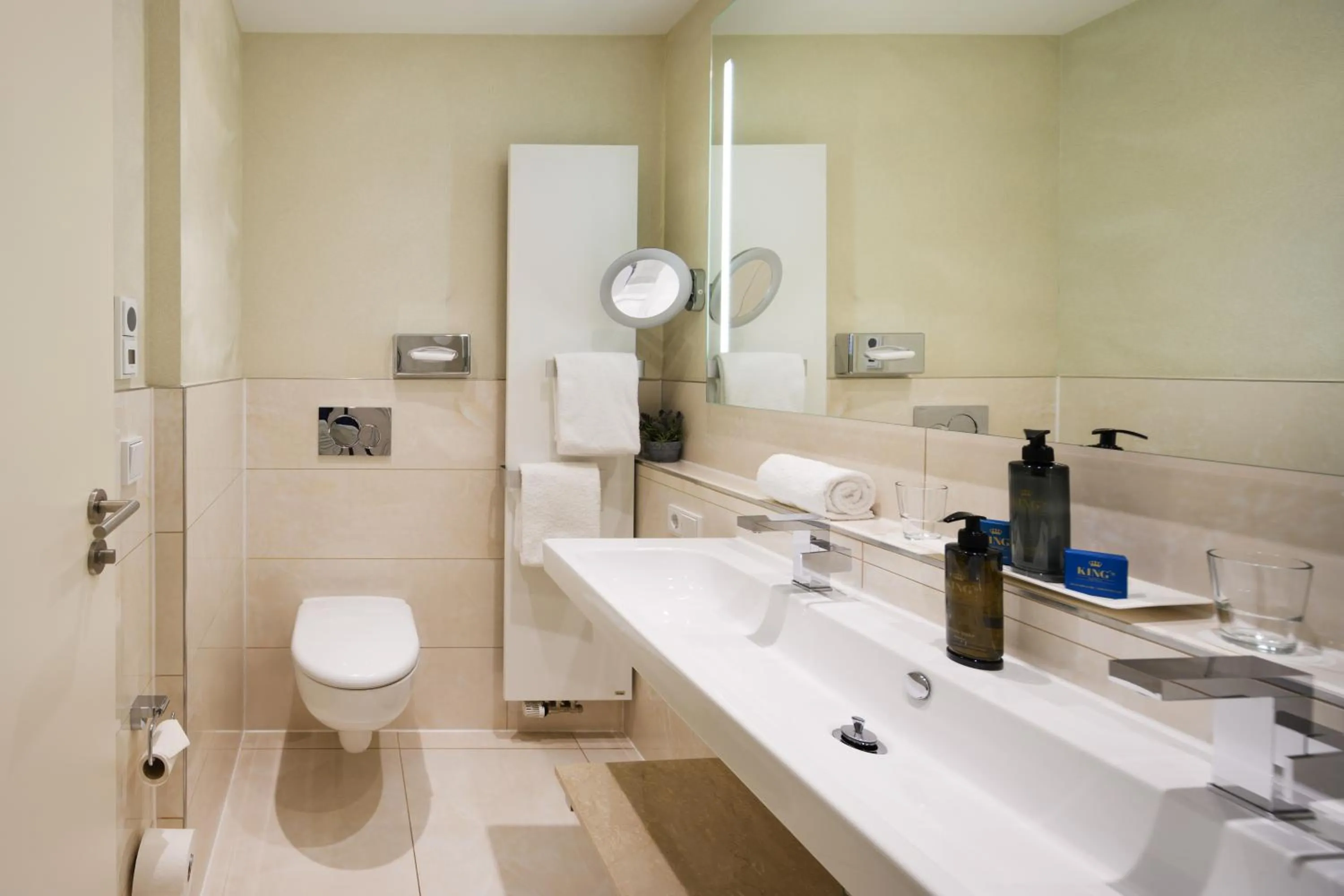 Bathroom in KING's Hotel First