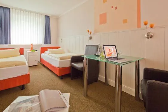 Photo of the whole room, Bed in Kocks Hotel Garni