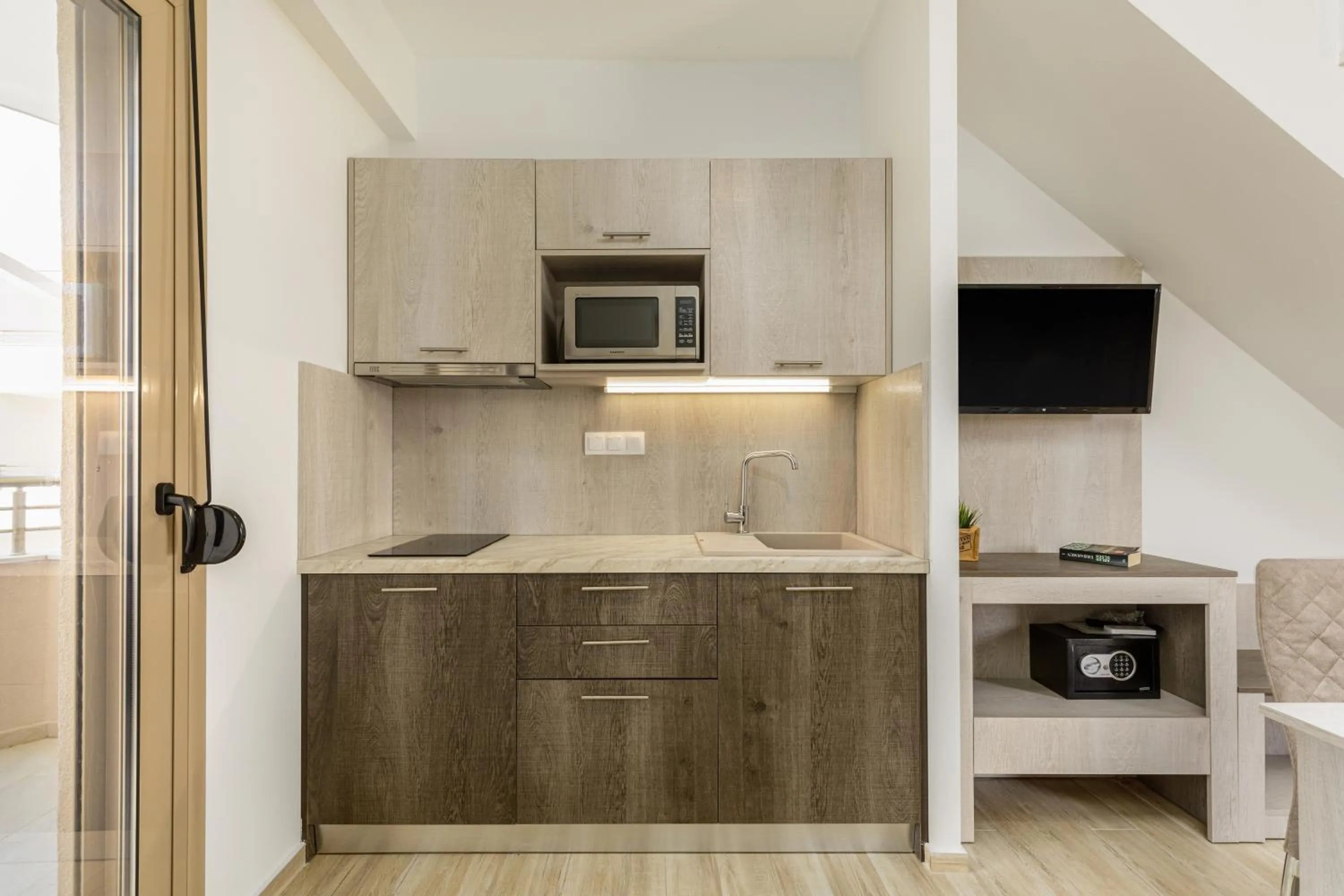 Kitchen or kitchenette in Aria Garden Suites