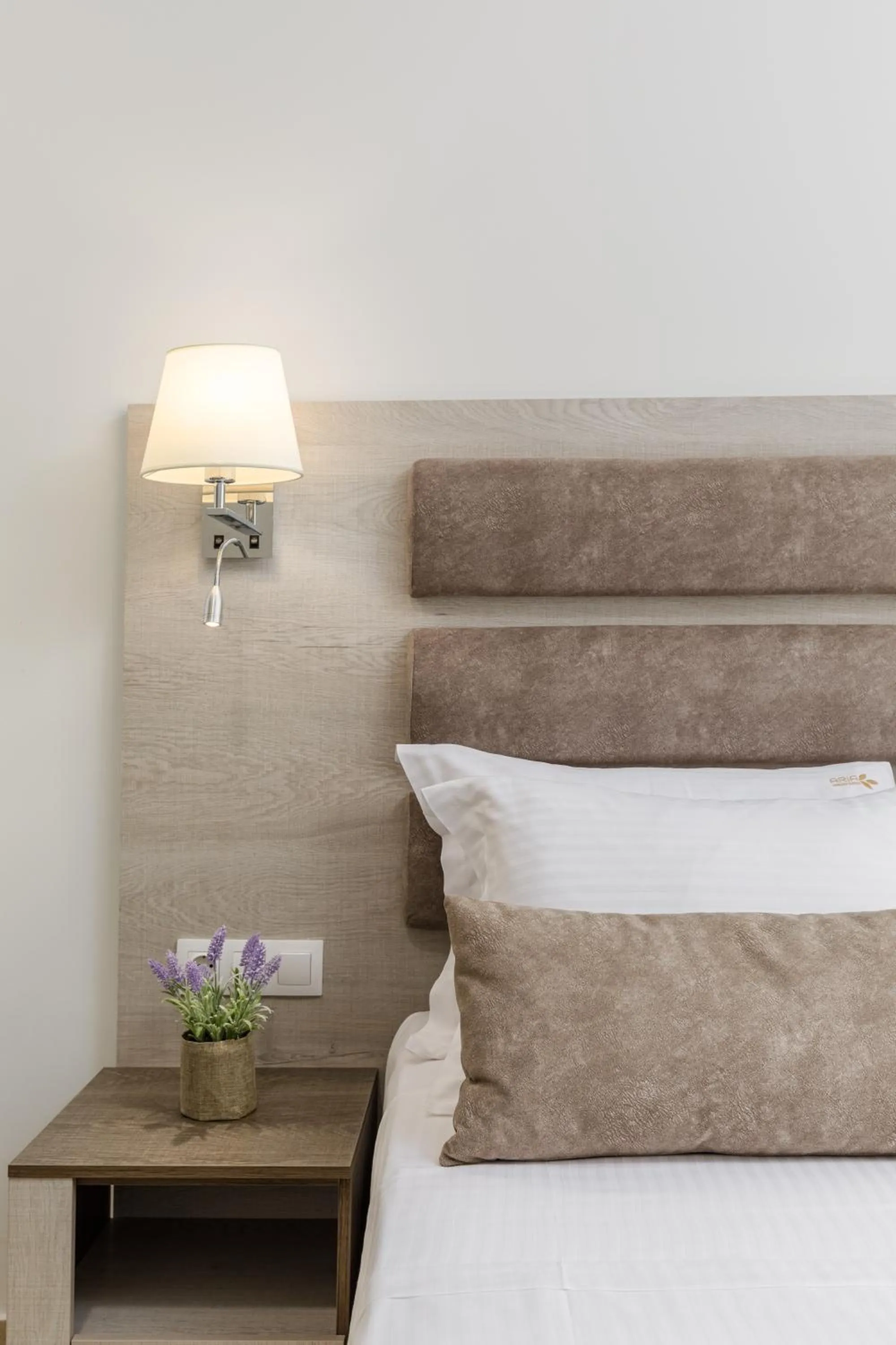 Bed in Aria Garden Suites