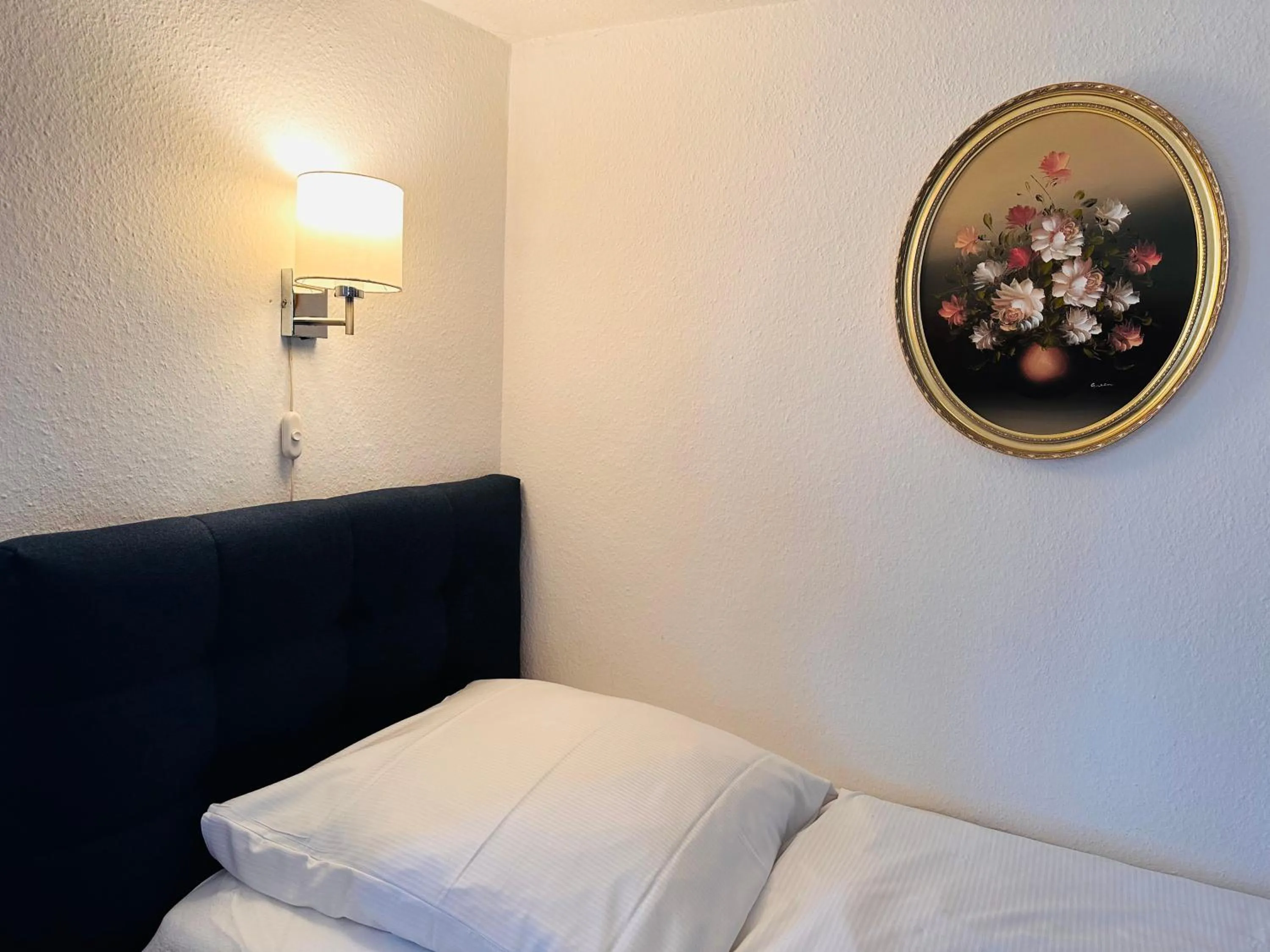 Bed in Altstadthotel Hayk am Rhein