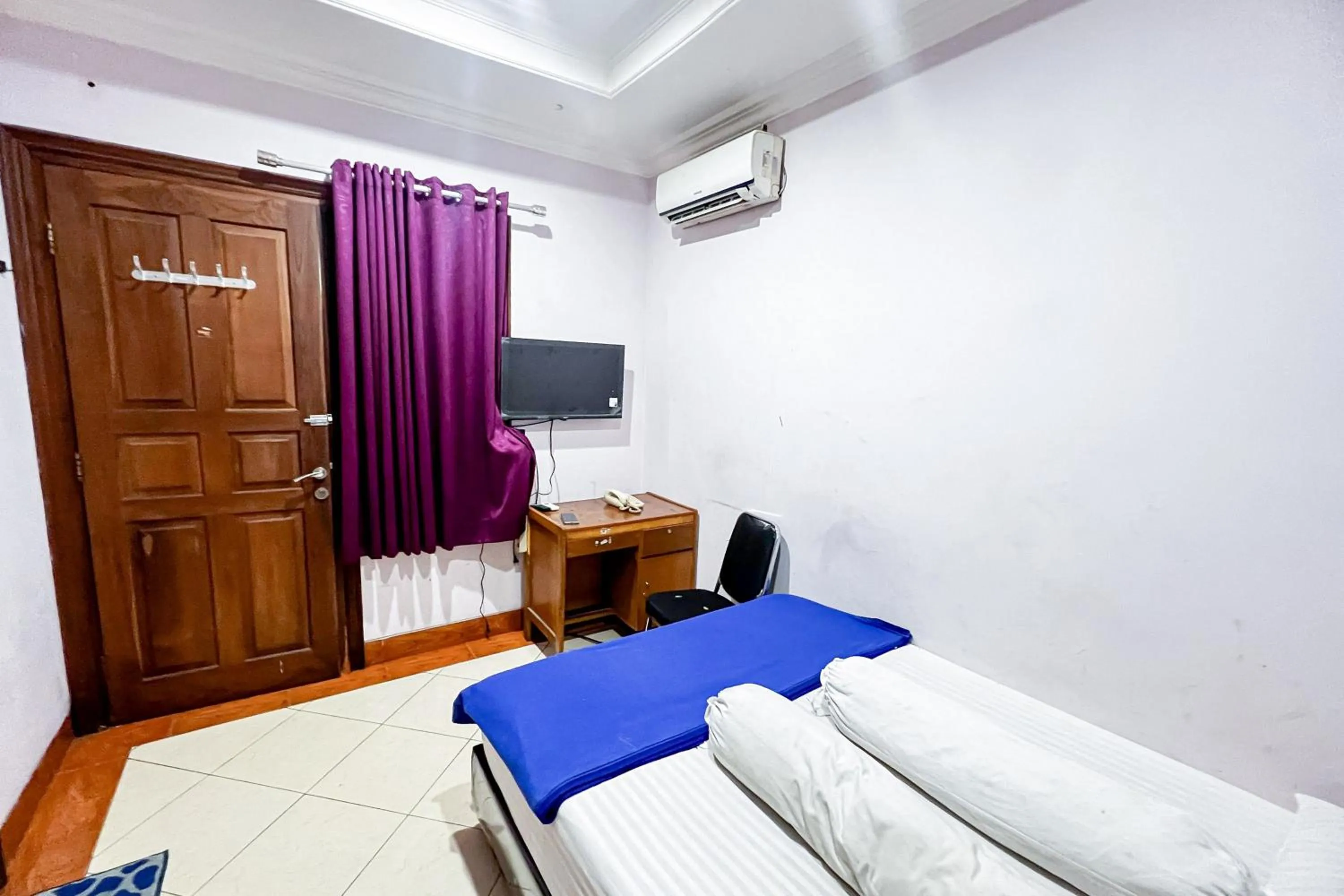 Bed in House Of Livina Mitra RedDoorz