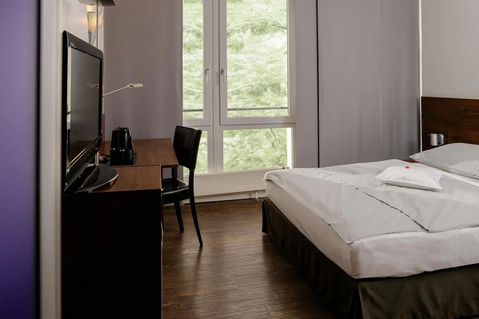 Photo of the whole room, Bed in Auszeit Hotel Düsseldorf - das Frühstückshotel