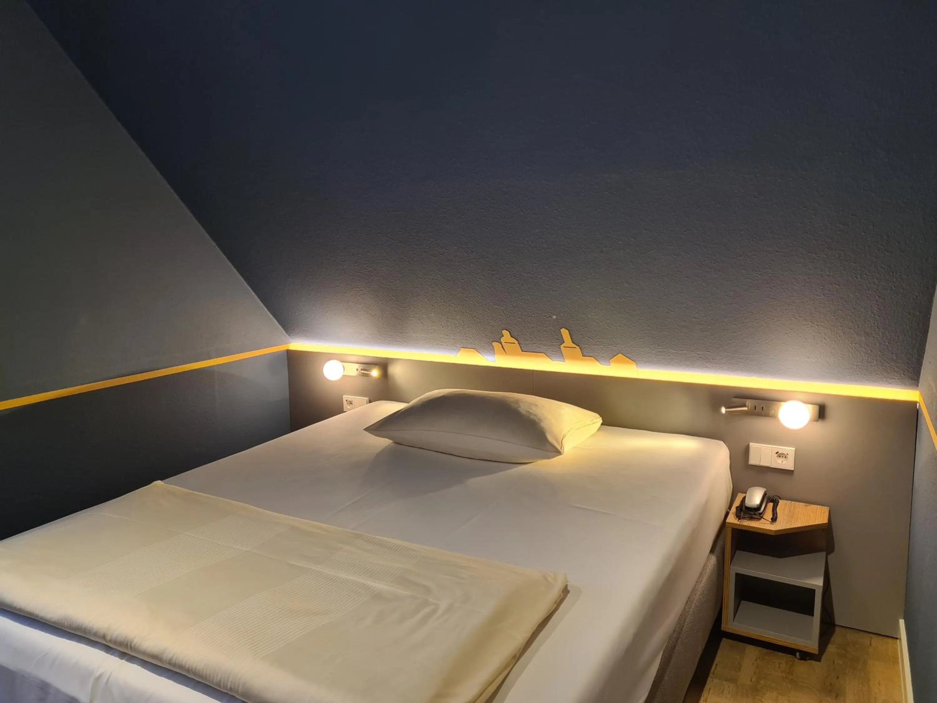 Photo of the whole room, Bed in Stadthotel Engel