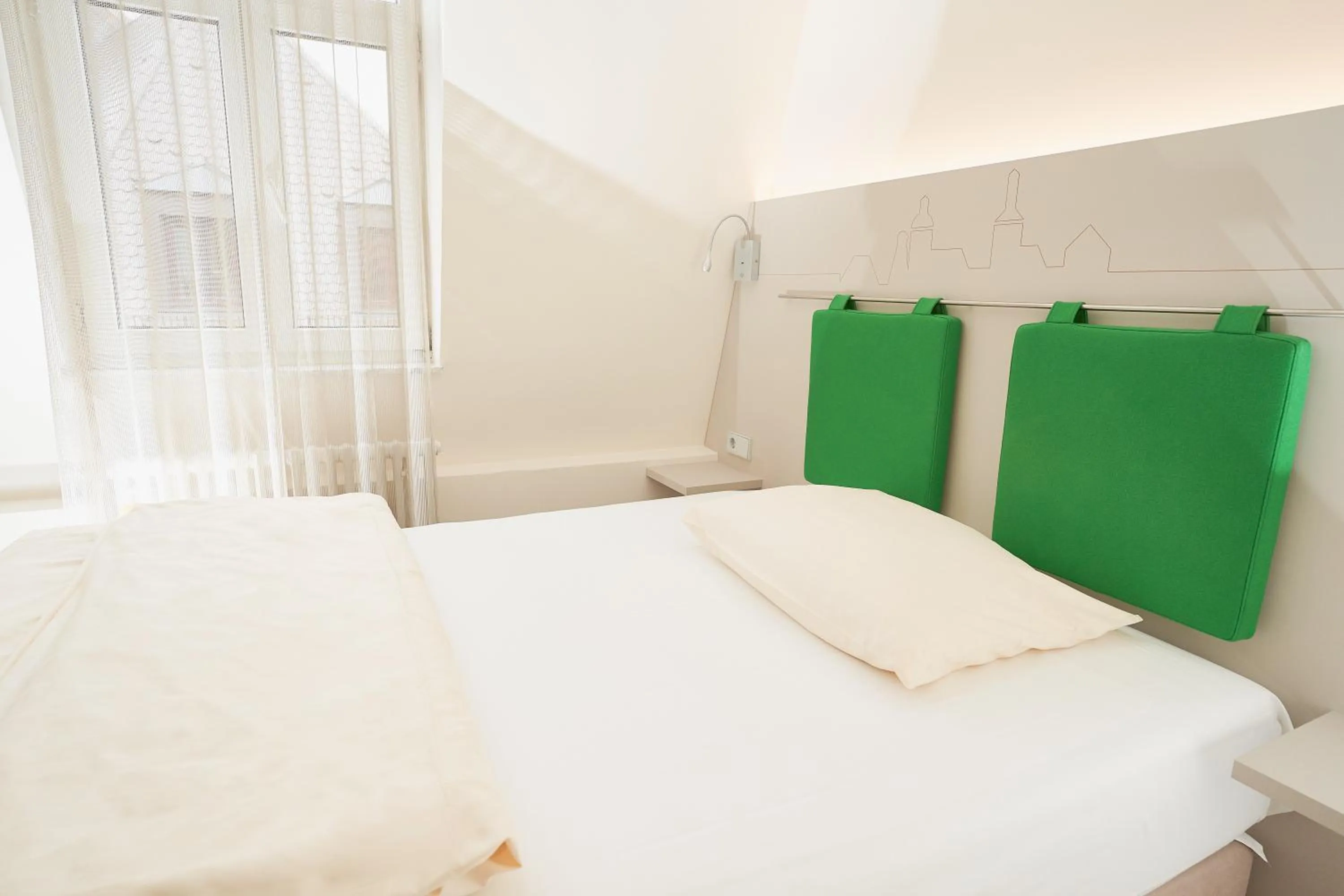 Decorative detail, Bed in Stadthotel Engel