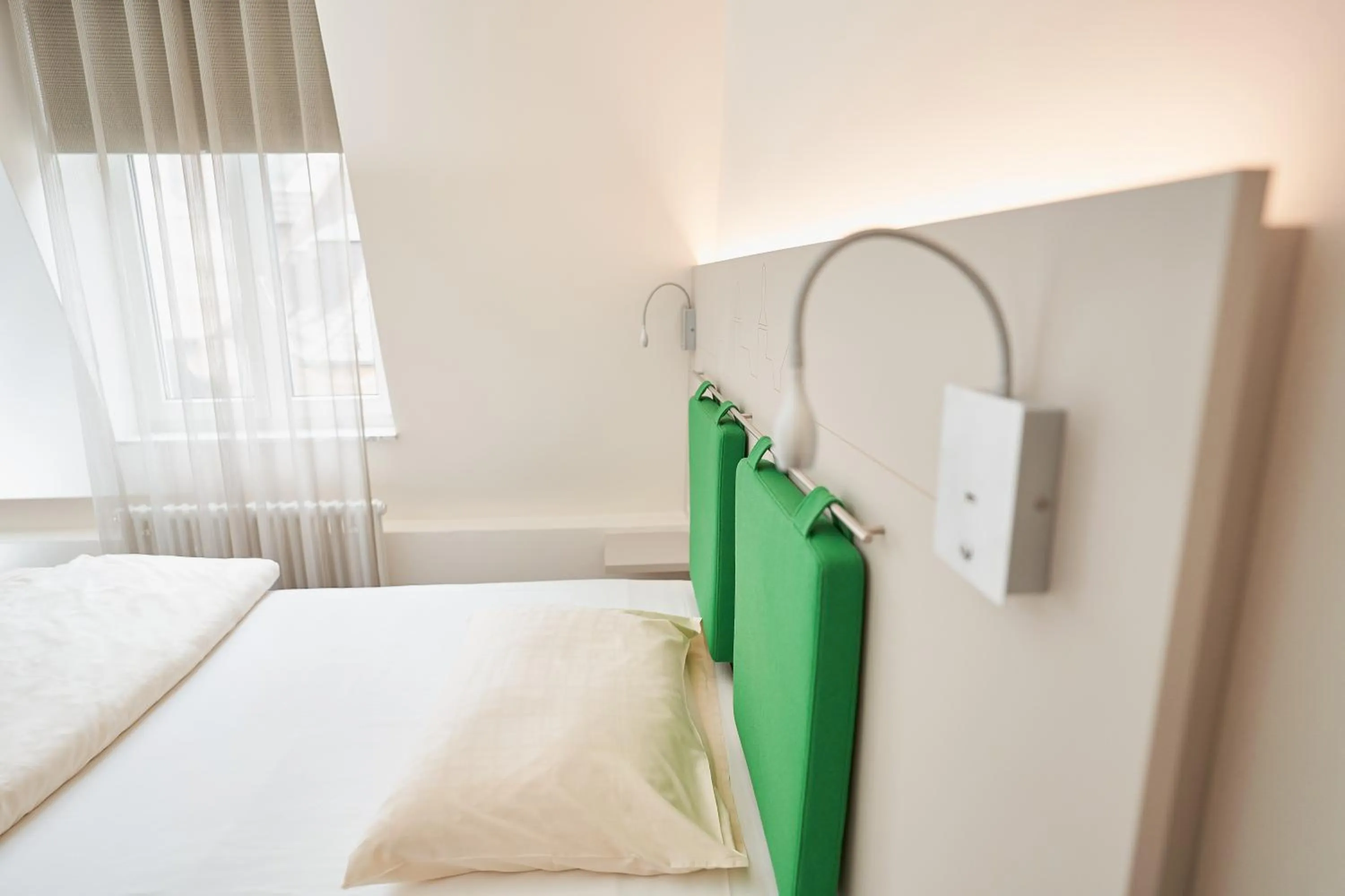 Decorative detail, Bed in Stadthotel Engel