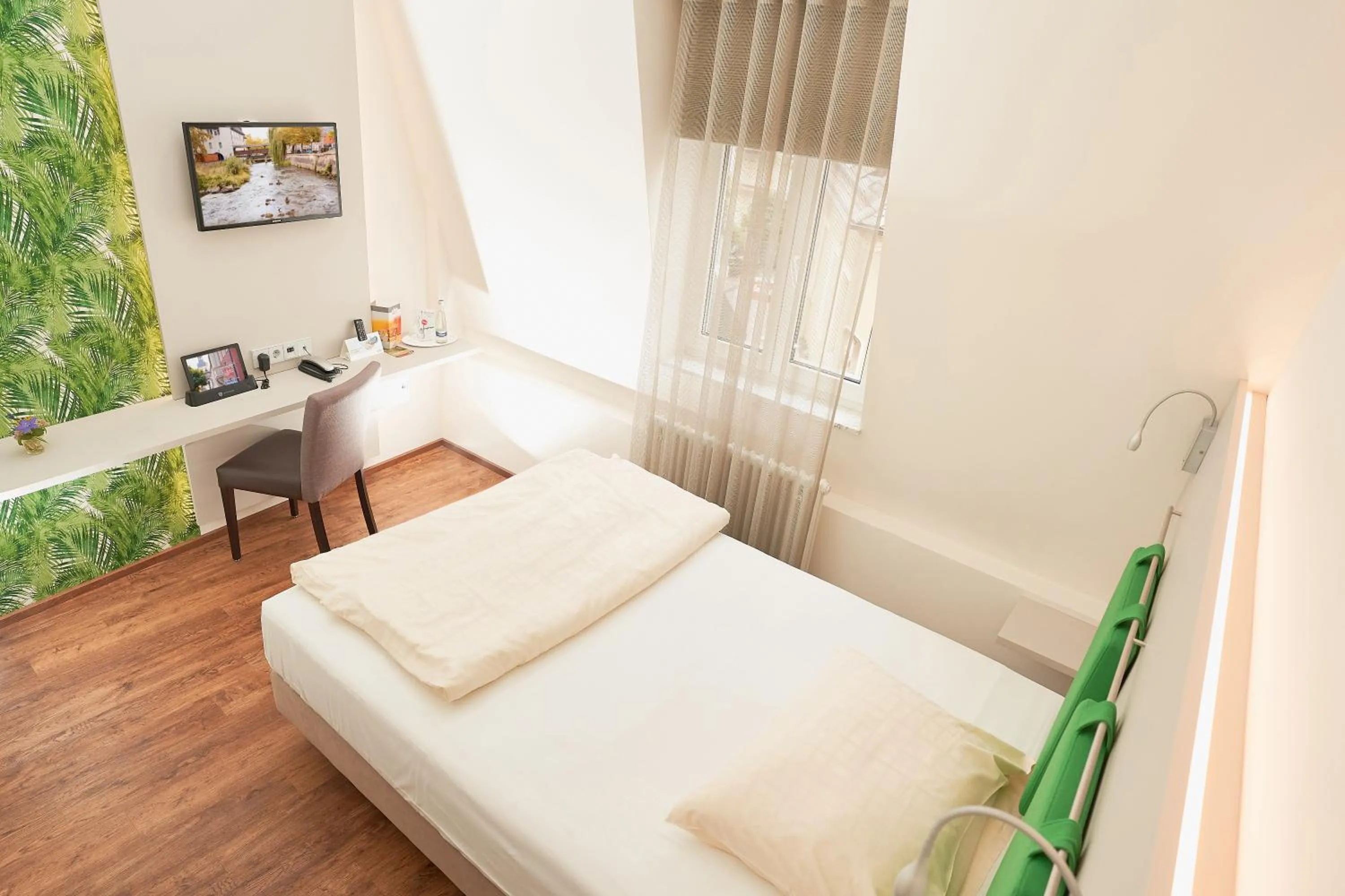 Photo of the whole room, Bed in Stadthotel Engel