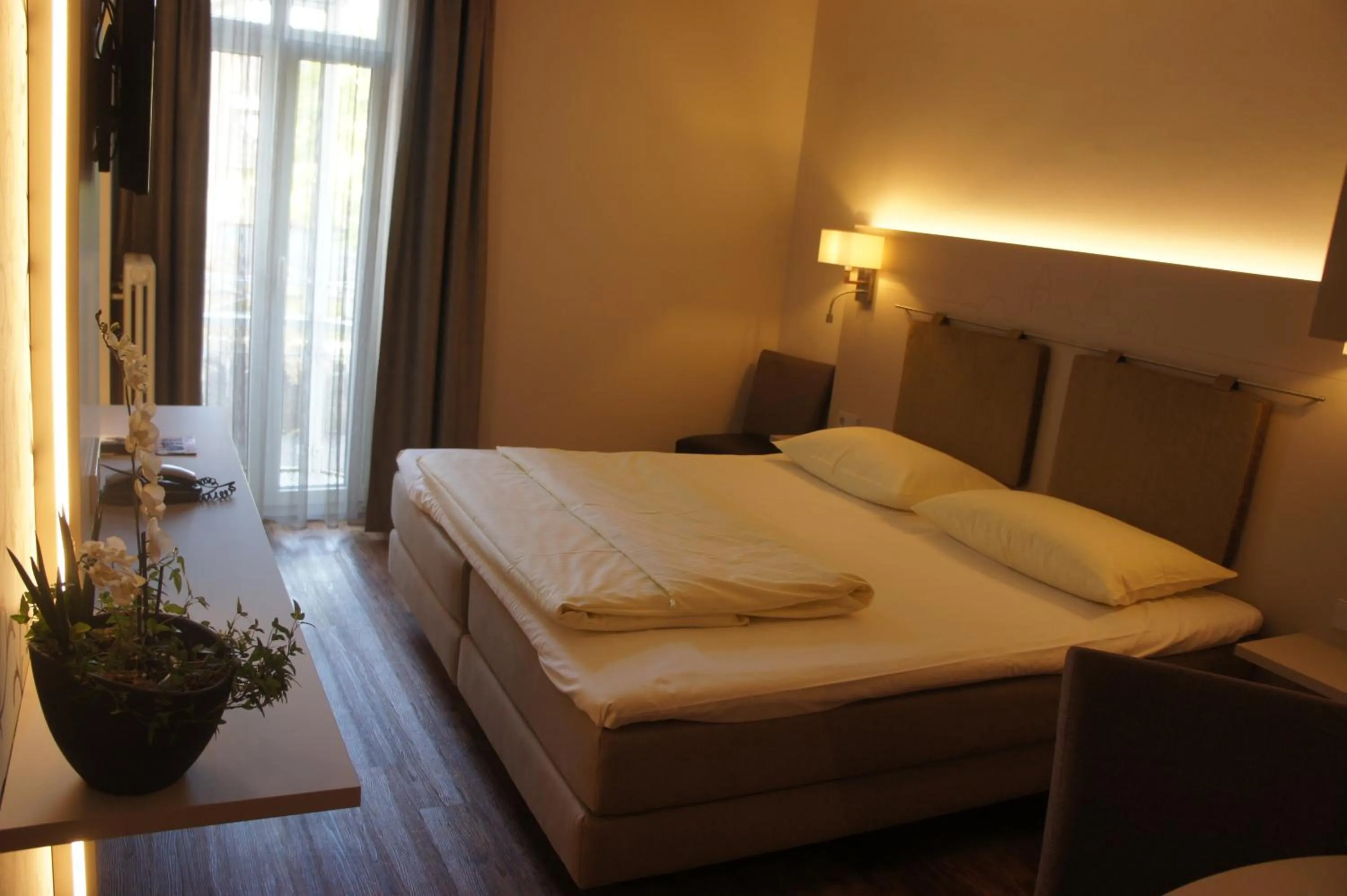 Photo of the whole room, Bed in Stadthotel Engel