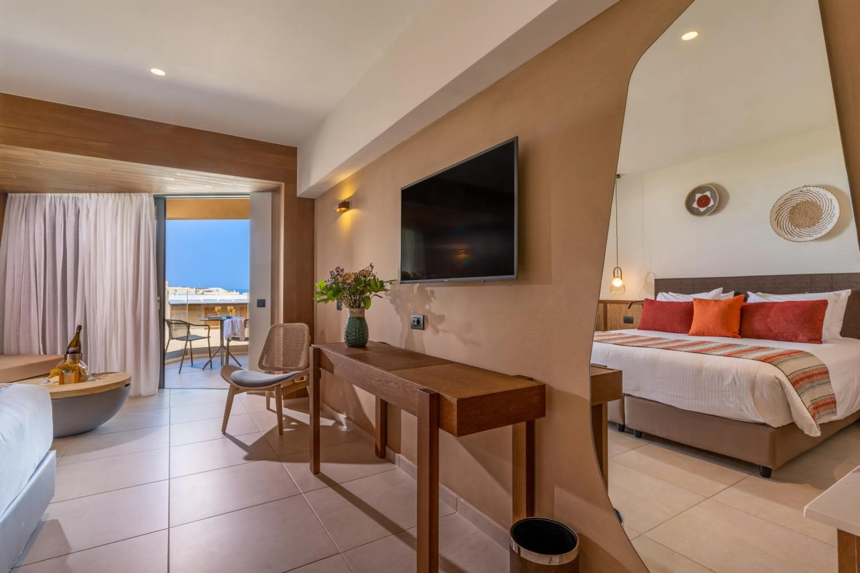 TV and multimedia, Bed in Minos Ambassador Suites & Spa - Adults only