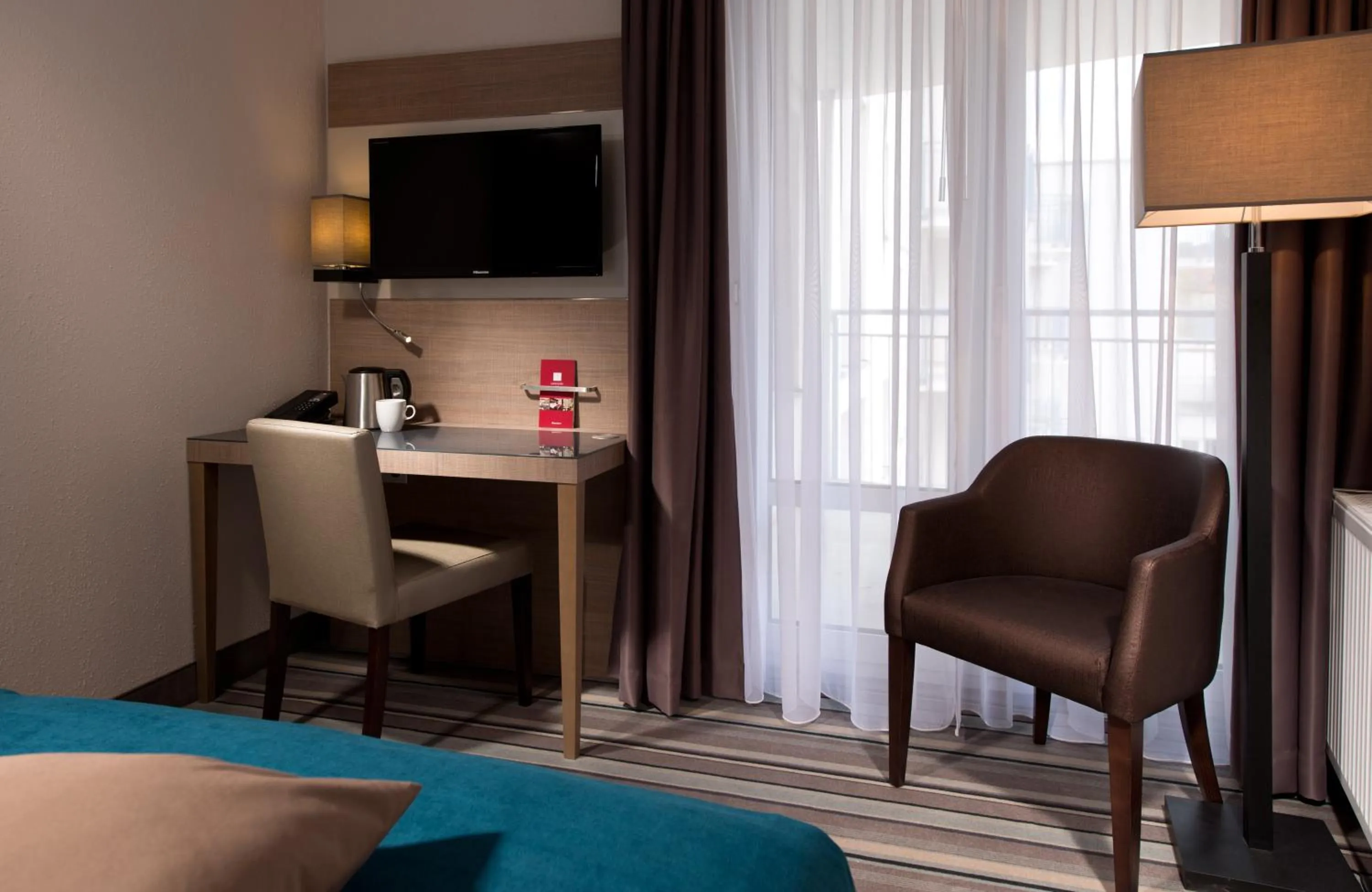 Photo of the whole room, Bed in Leonardo Hotel Munich City Olympiapark