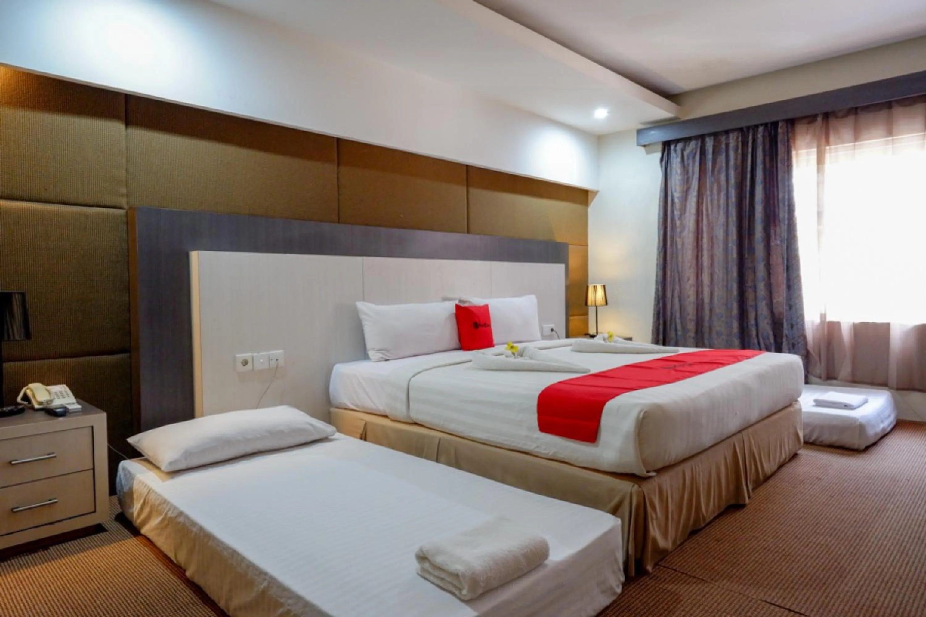 Bedroom, Bed in RedDoorz Plus near Hotel Benua Kendari