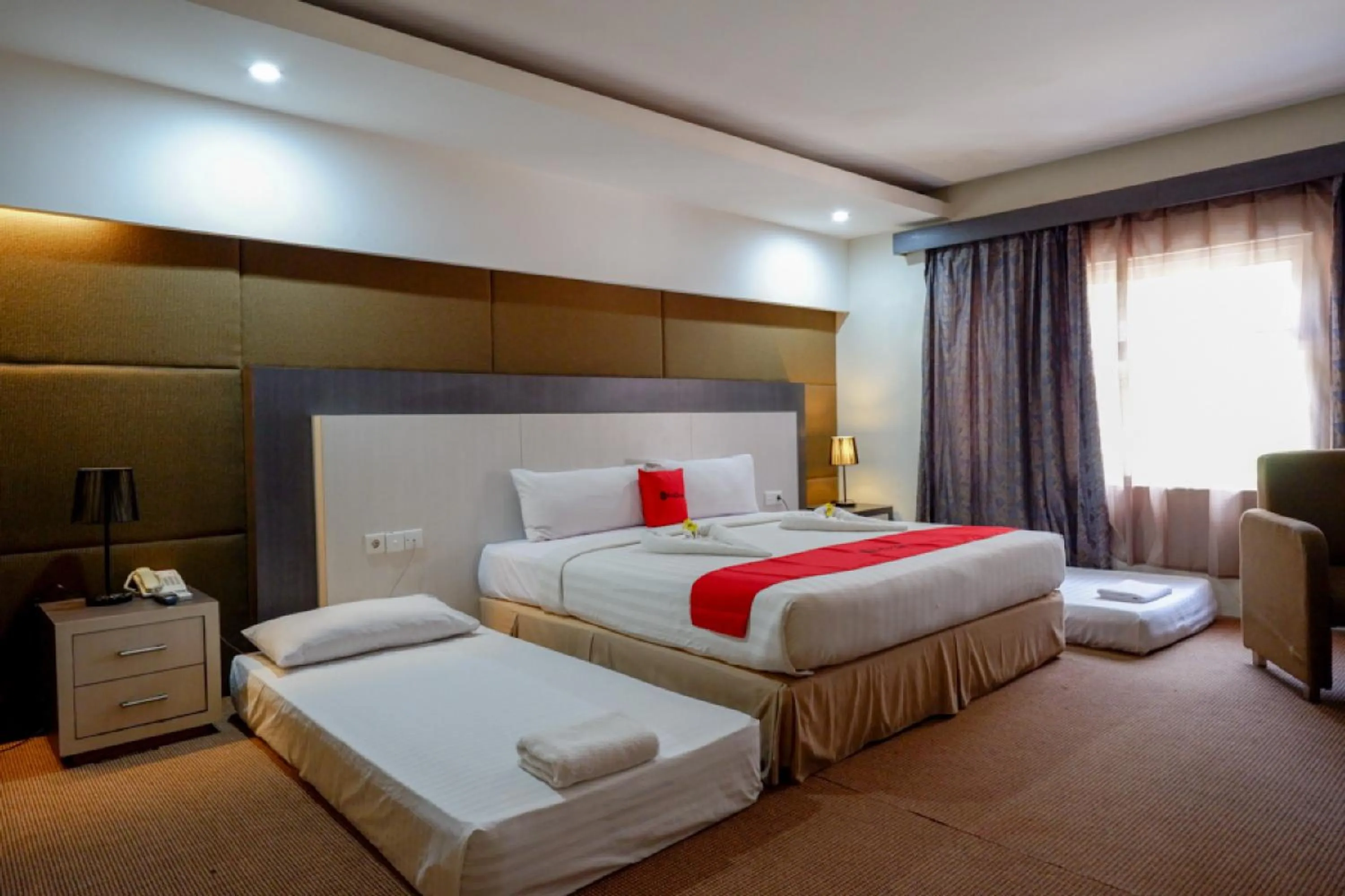 Bedroom, Bed in RedDoorz Plus near Hotel Benua Kendari
