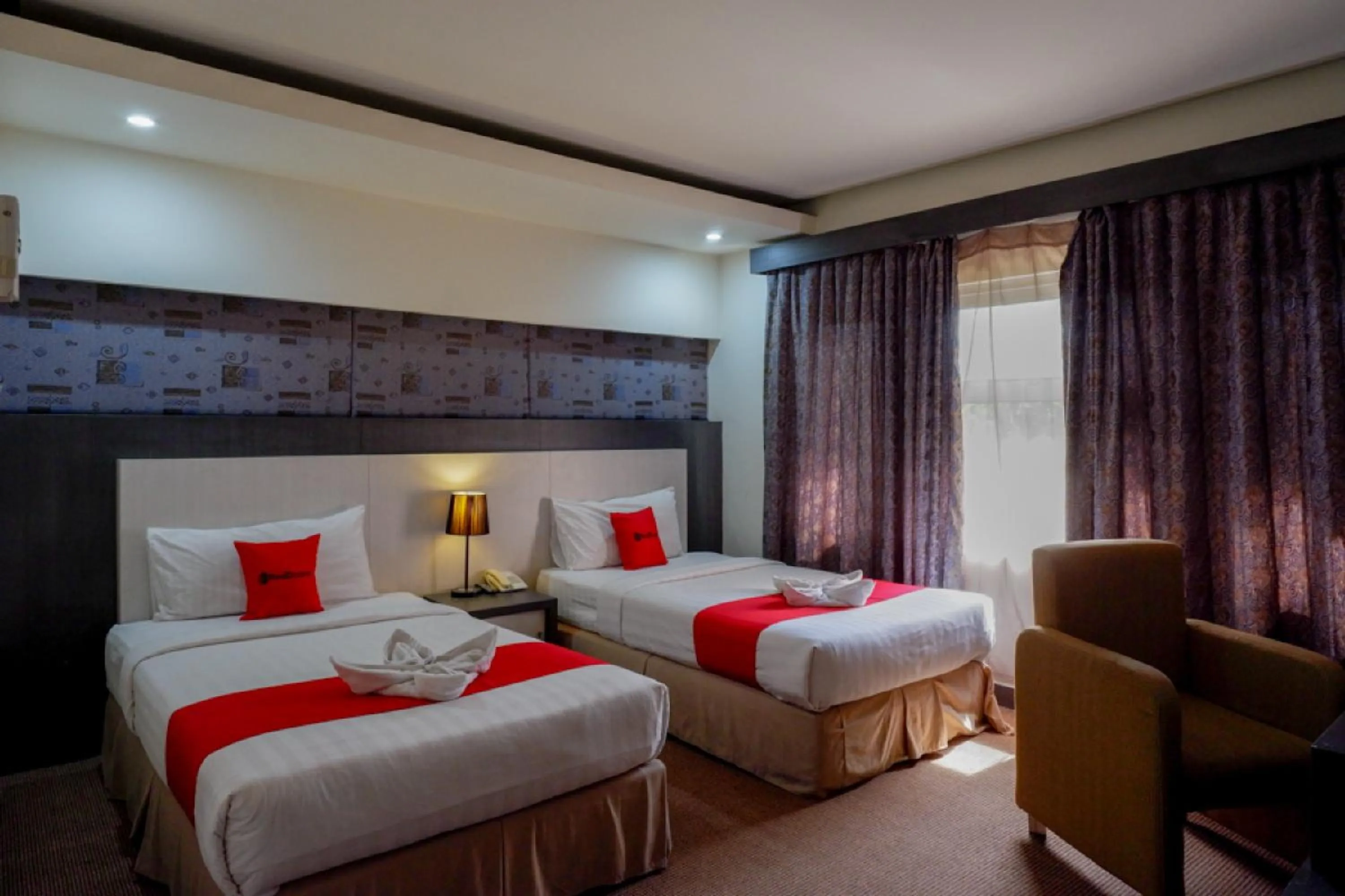 Bedroom, Bed in RedDoorz Plus near Hotel Benua Kendari