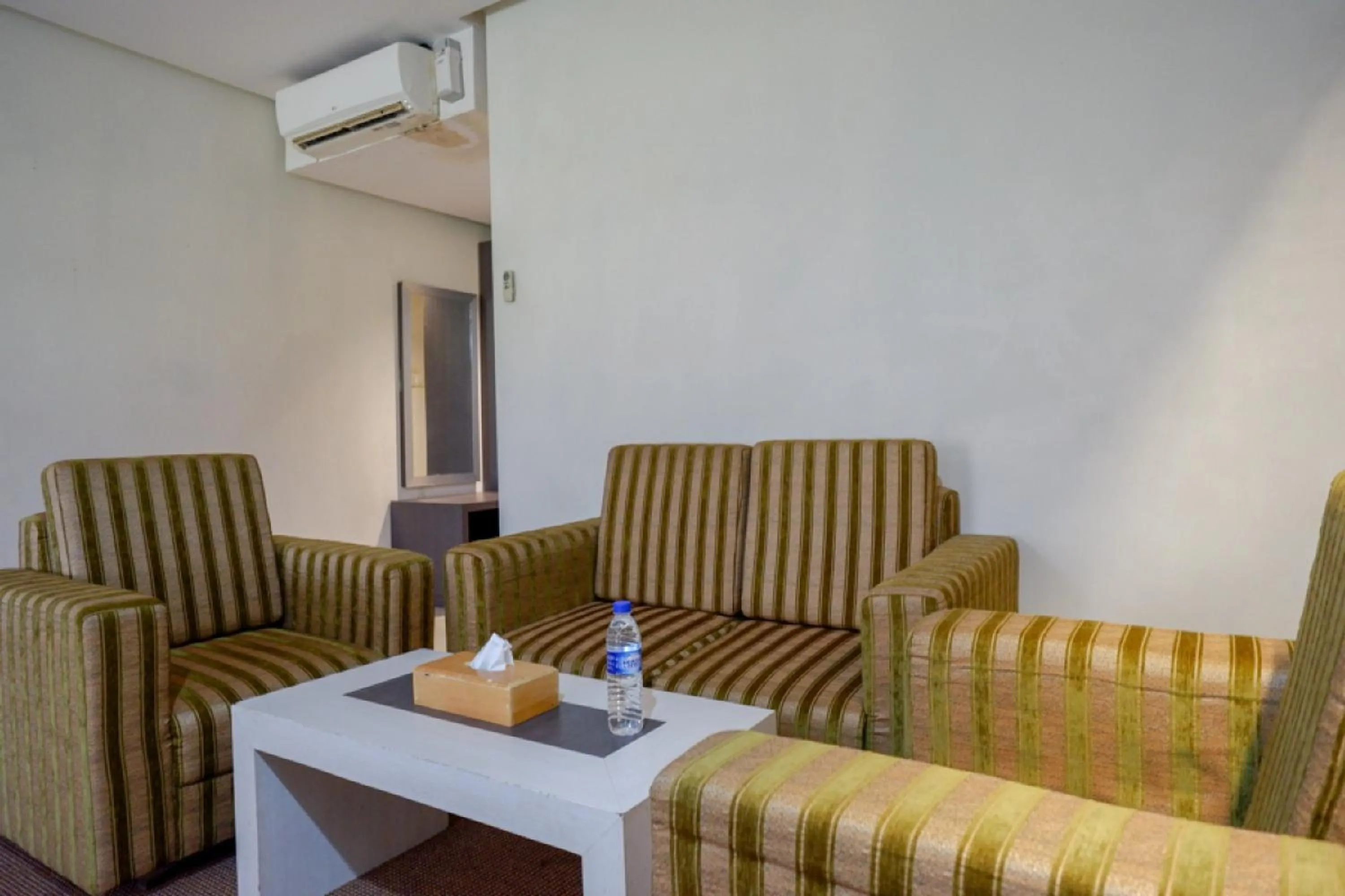 Seating area in RedDoorz Plus near Hotel Benua Kendari