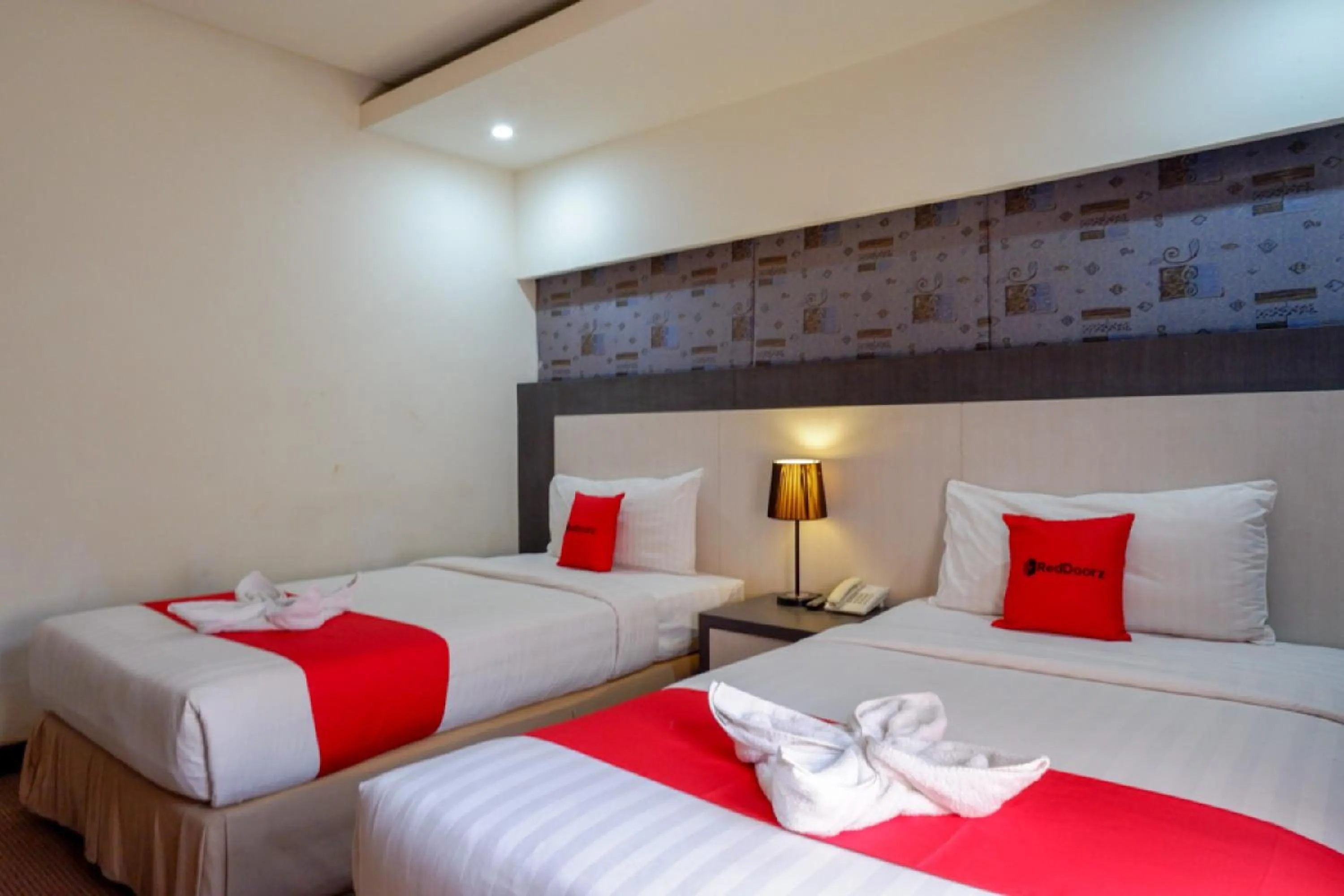 Bedroom, Bed in RedDoorz Plus near Hotel Benua Kendari
