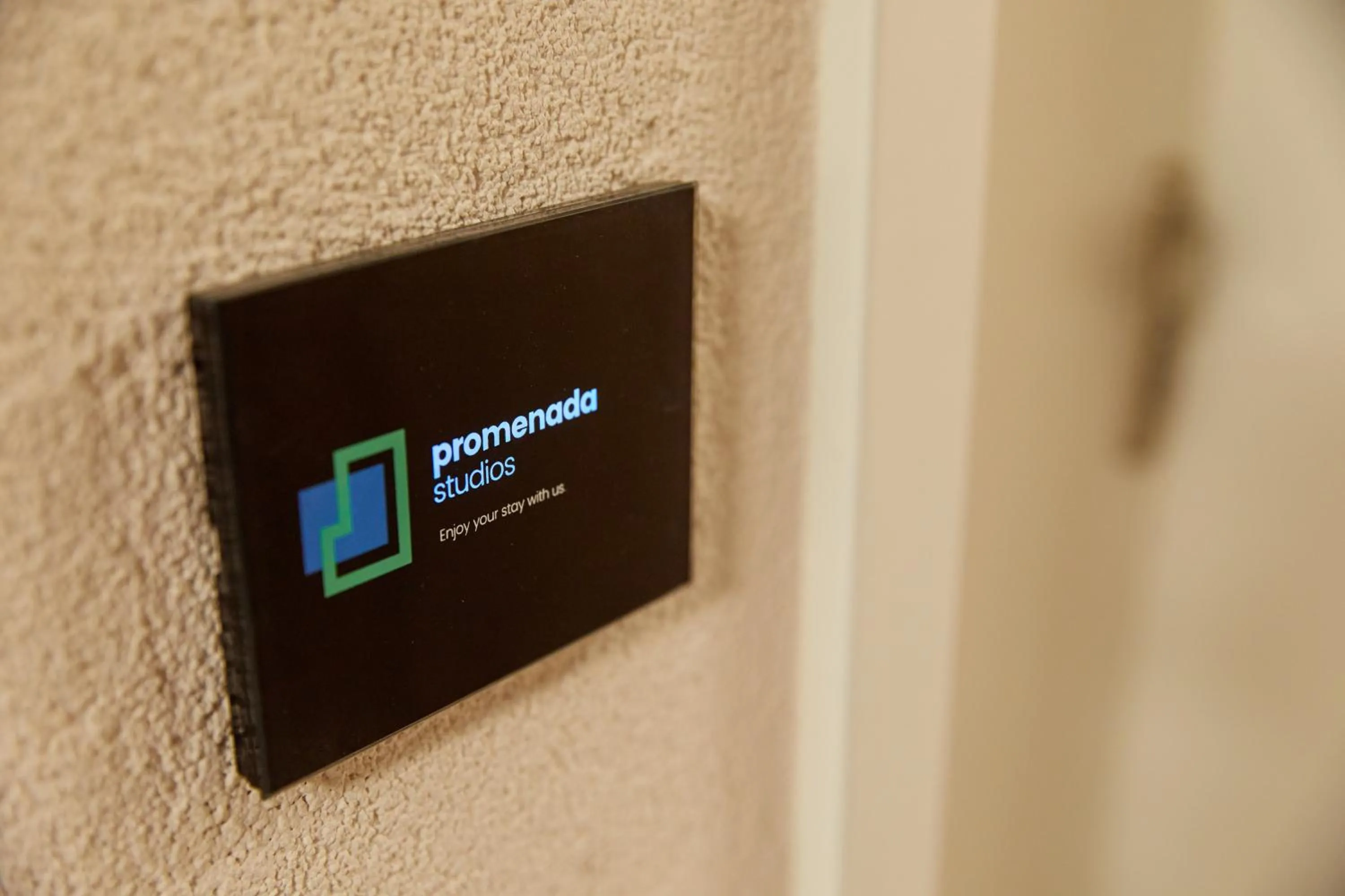 Property logo or sign in Promenada Studios